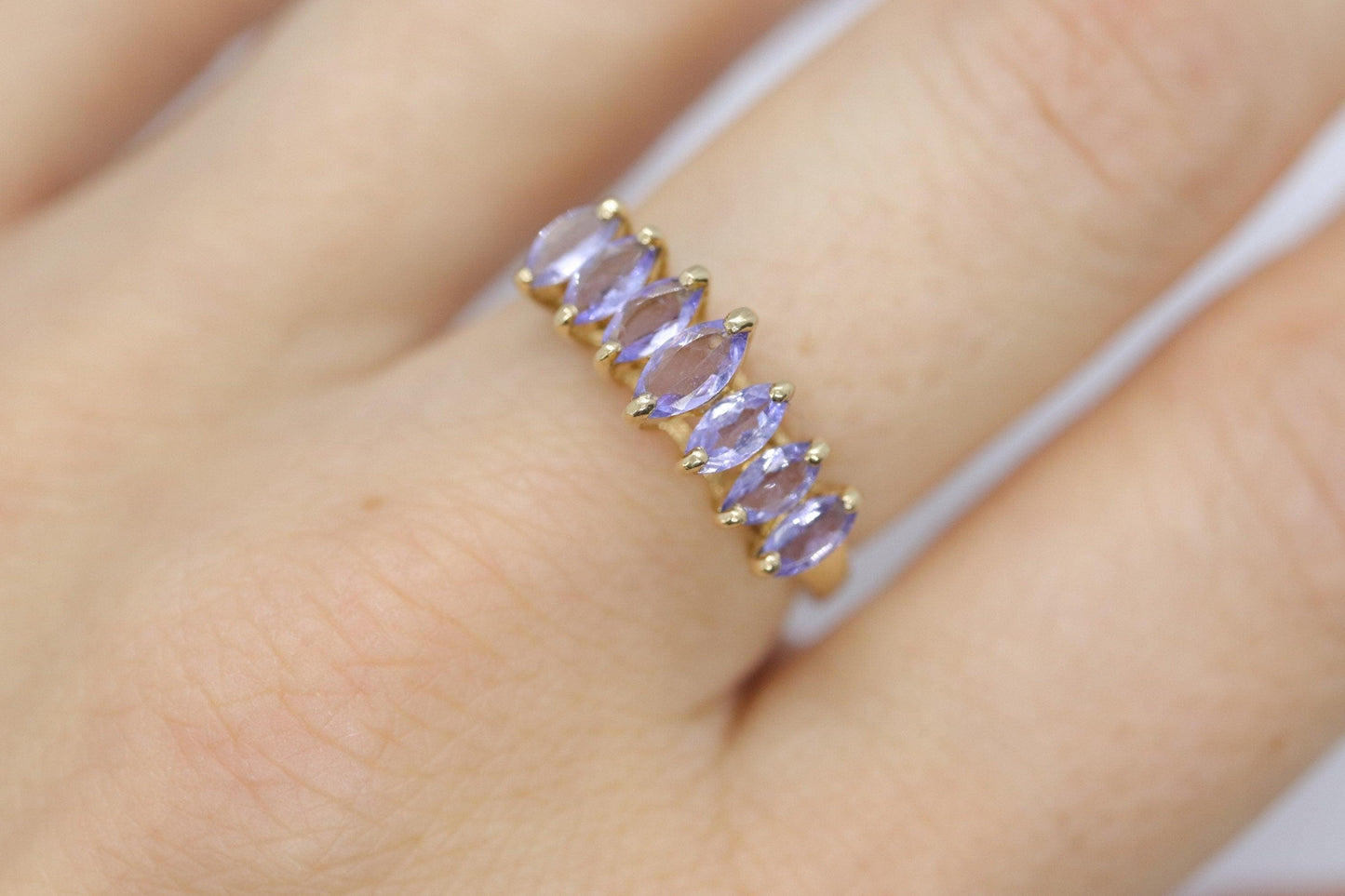 10k Tanzanite Marquise Anniversary ring. 7 stone Tanzanite band. Journey Band
