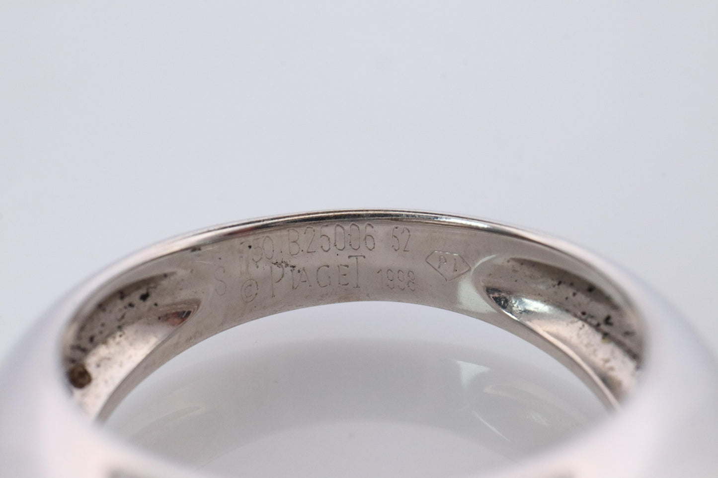 Genuine Piaget Oval Sapphire and Diamond Solitaire Ring. 18k White Gold Band