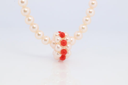 Tasaki Necklace. 18k Tasaki Pearl and Coral Bead Strand Necklace.