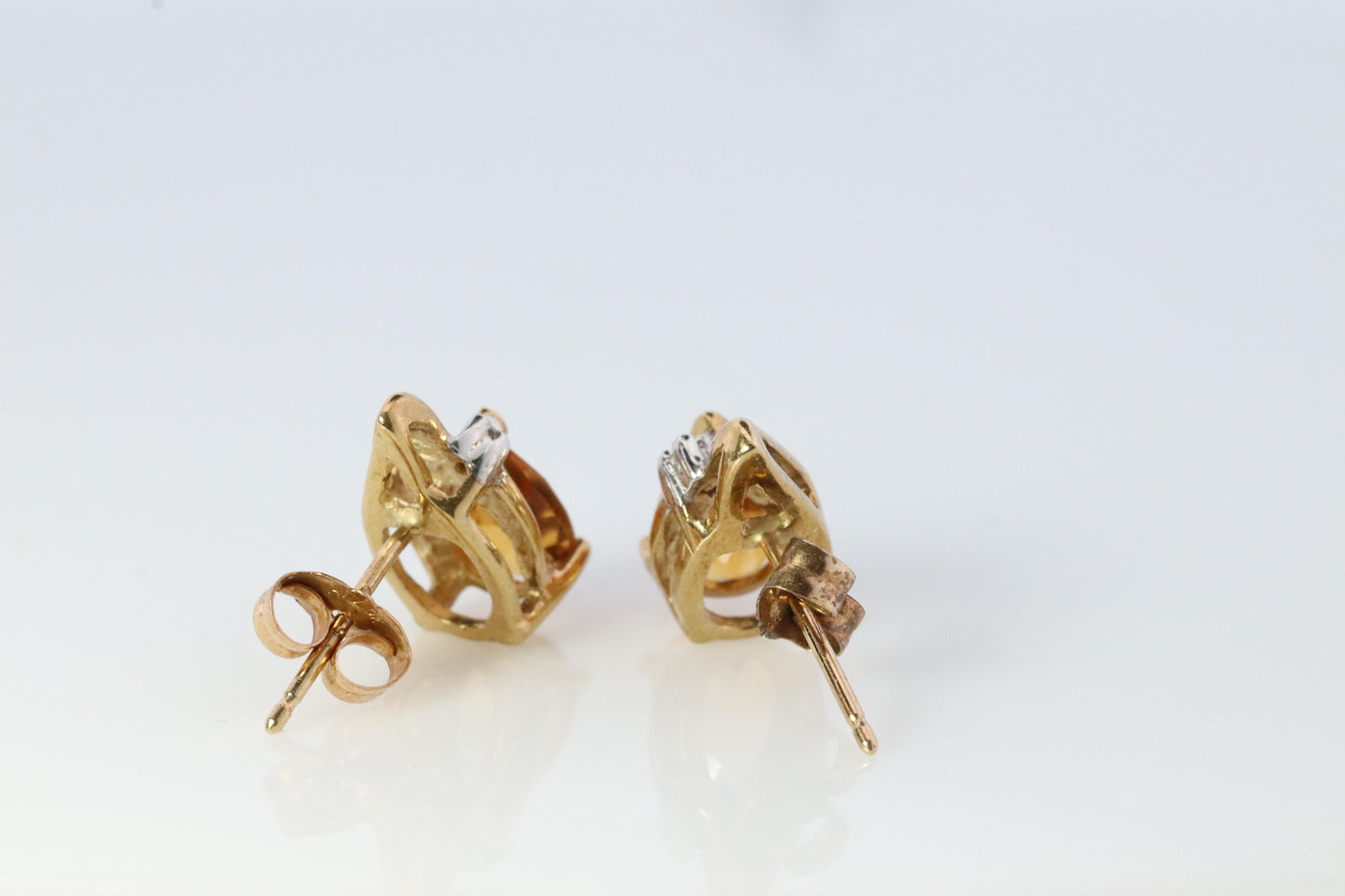 10k Pear Citrine Earrings. Pearl and diamond Bypass stud earrings.