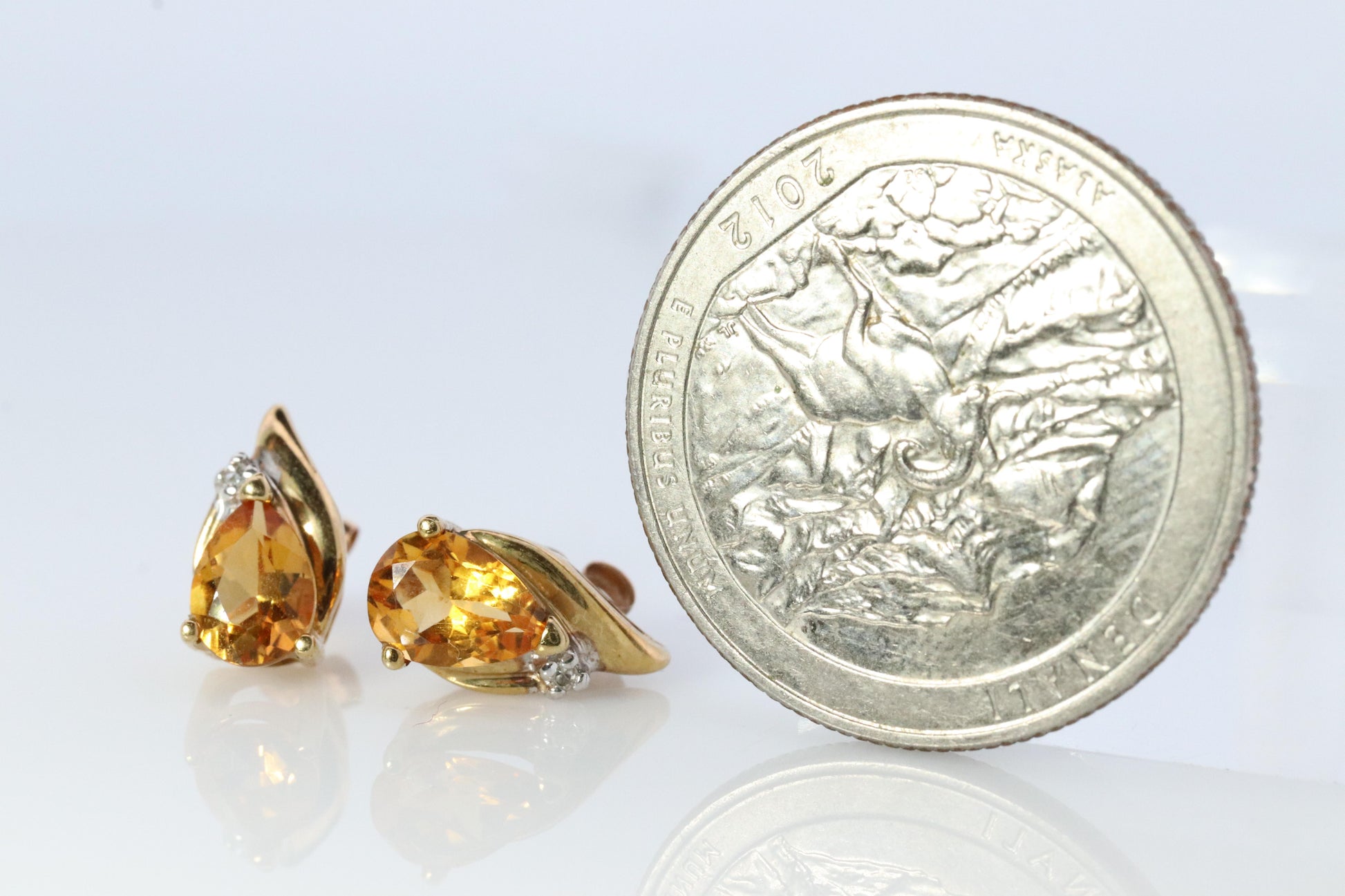 10k Pear Citrine Earrings. Pearl and diamond Bypass stud earrings.