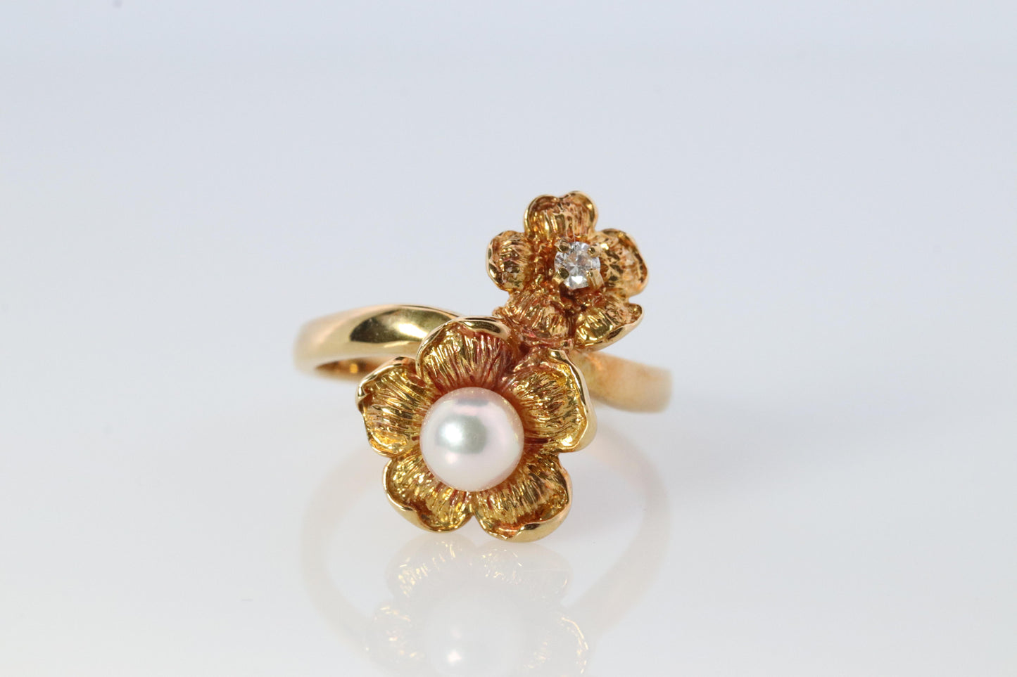Mikimoto Ring. Vintage 18k Gold Mikimoto Pearl Diamond Double flower bypass ring