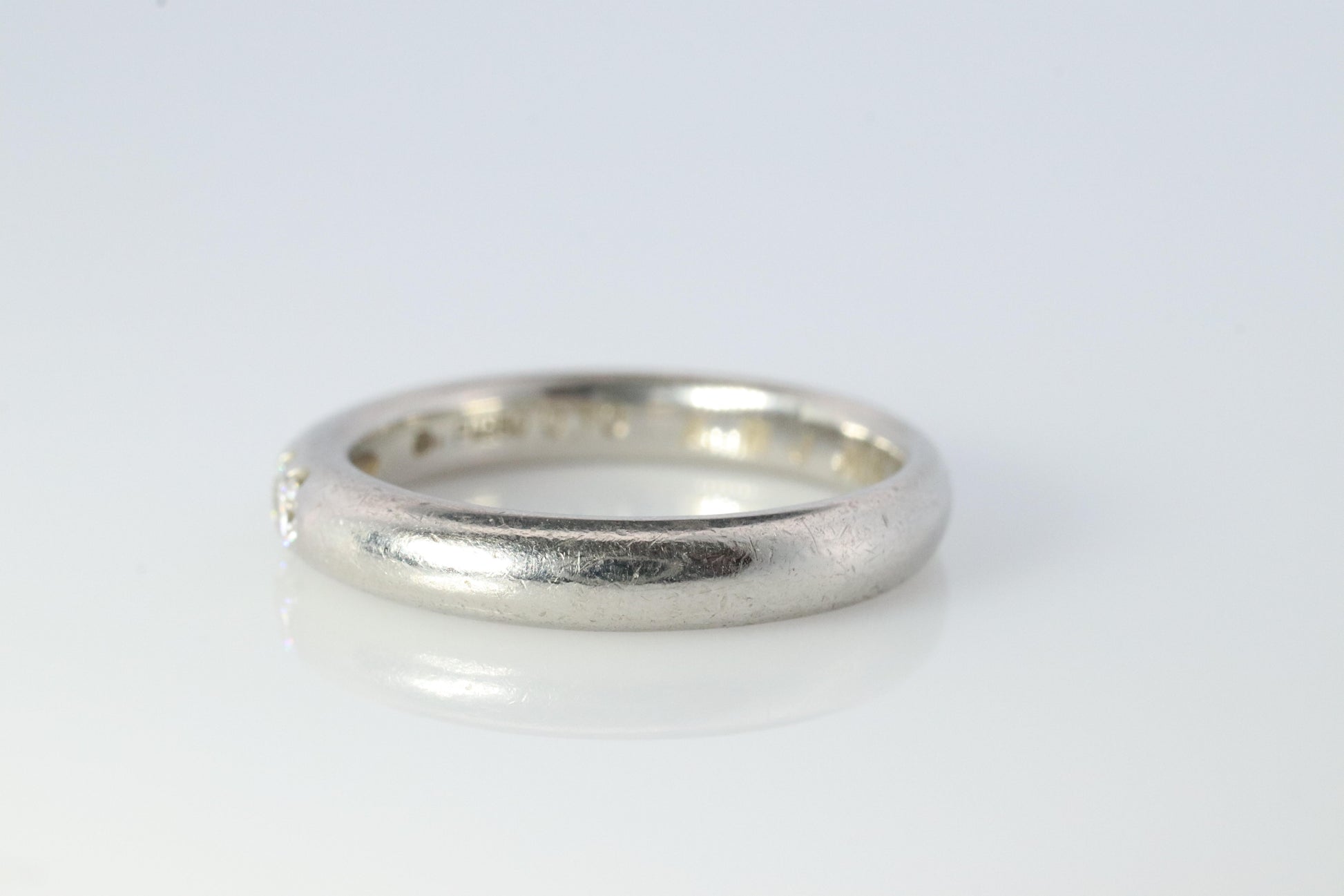 Mikimoto Ring. Vintage Platinum Mikimoto Diamond Bezel set band. Mikimoto PT950