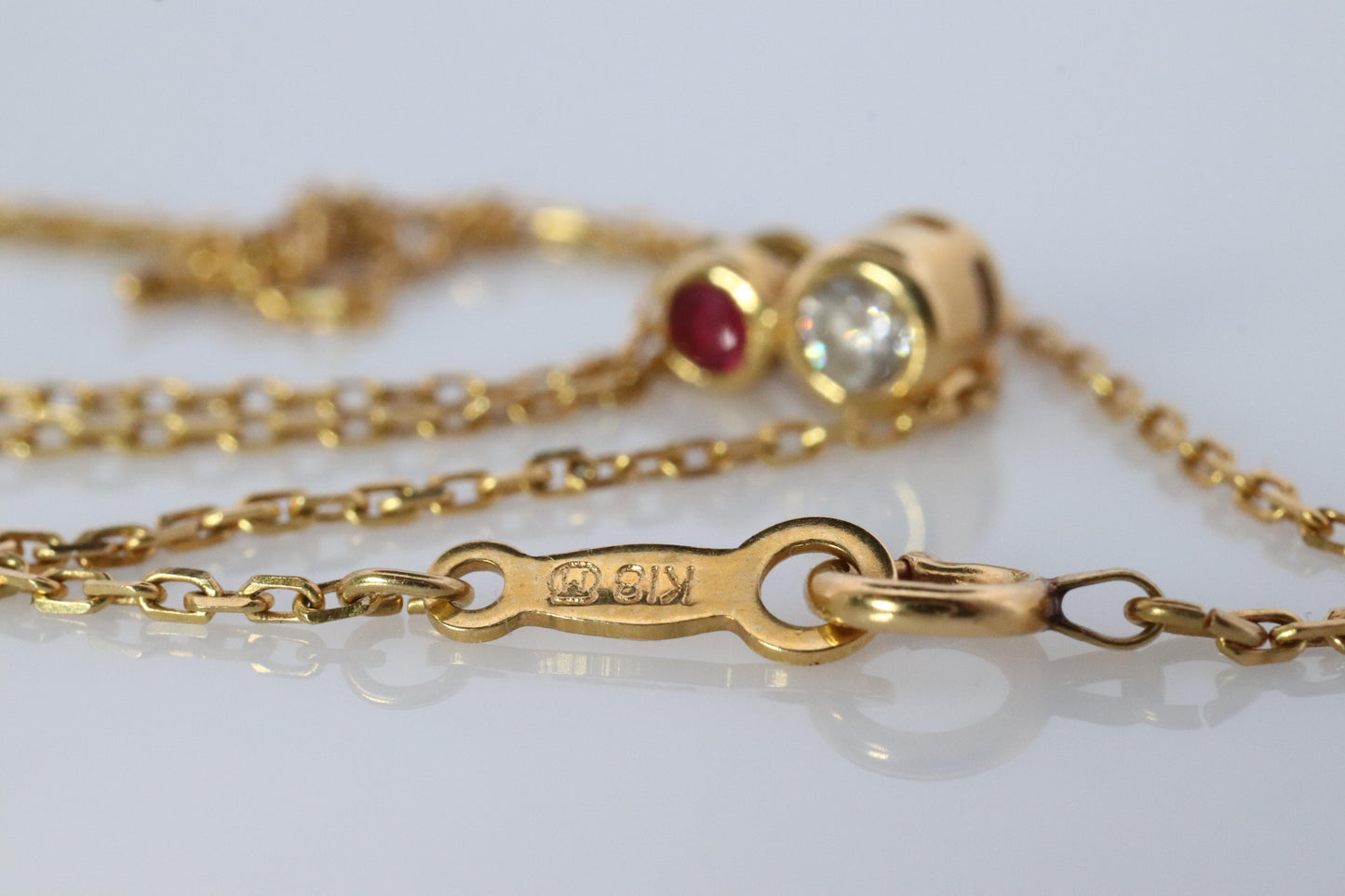 Mikimoto Pendant. 18k Yellow Gold Mikimoto Diamond Ruby Solitaire Necklace.