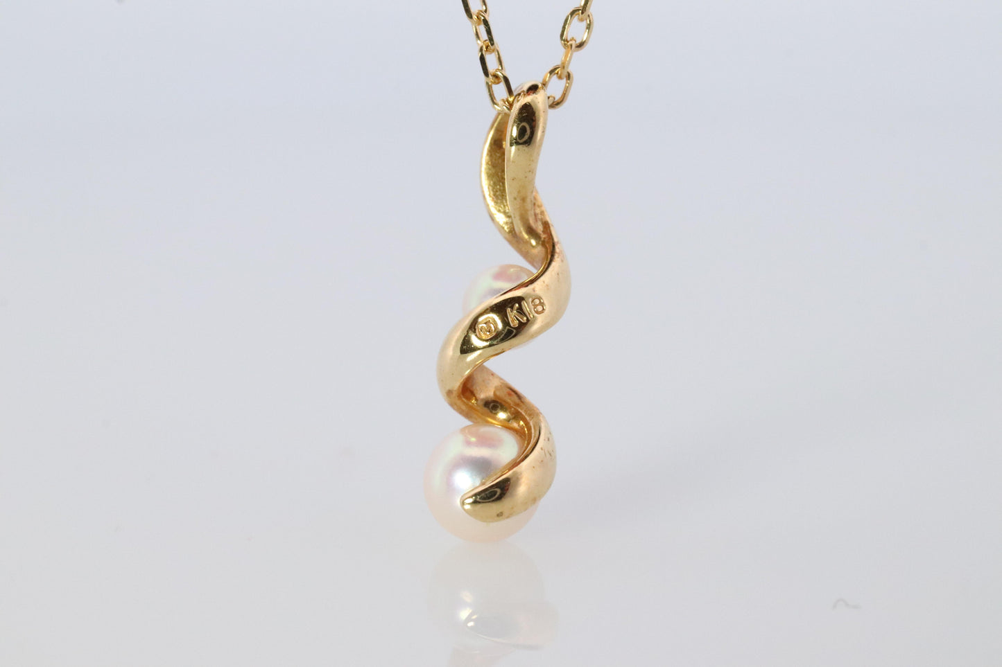 Mikimoto Pendant. 18k Gold Mikimoto Swirl Pearl Necklace.