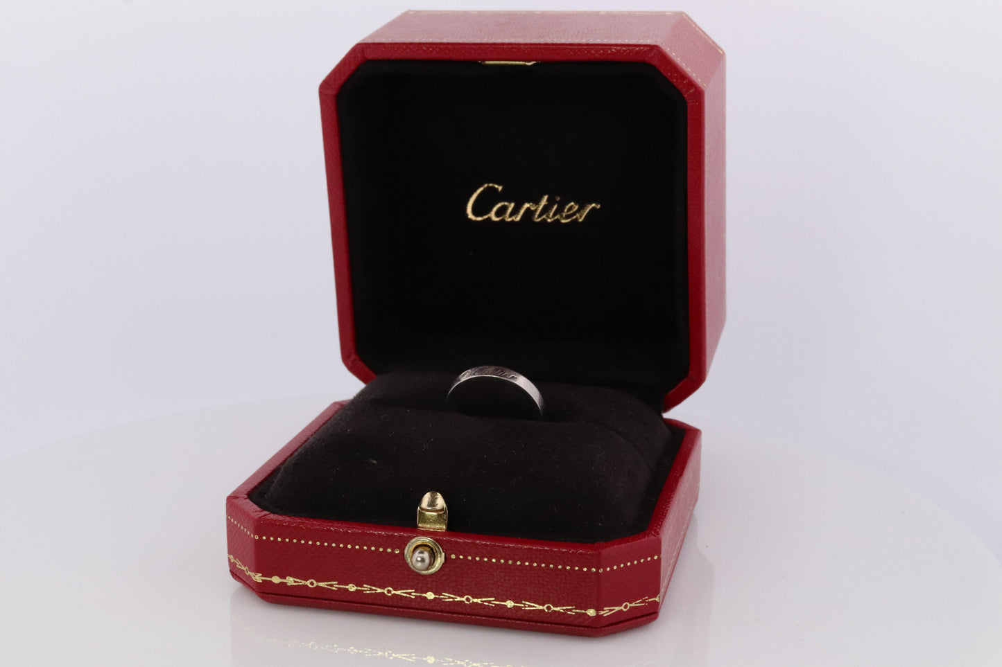 CARTIER Platinum Ring. Cartier Diamond Signature Bezel 3mm Band.