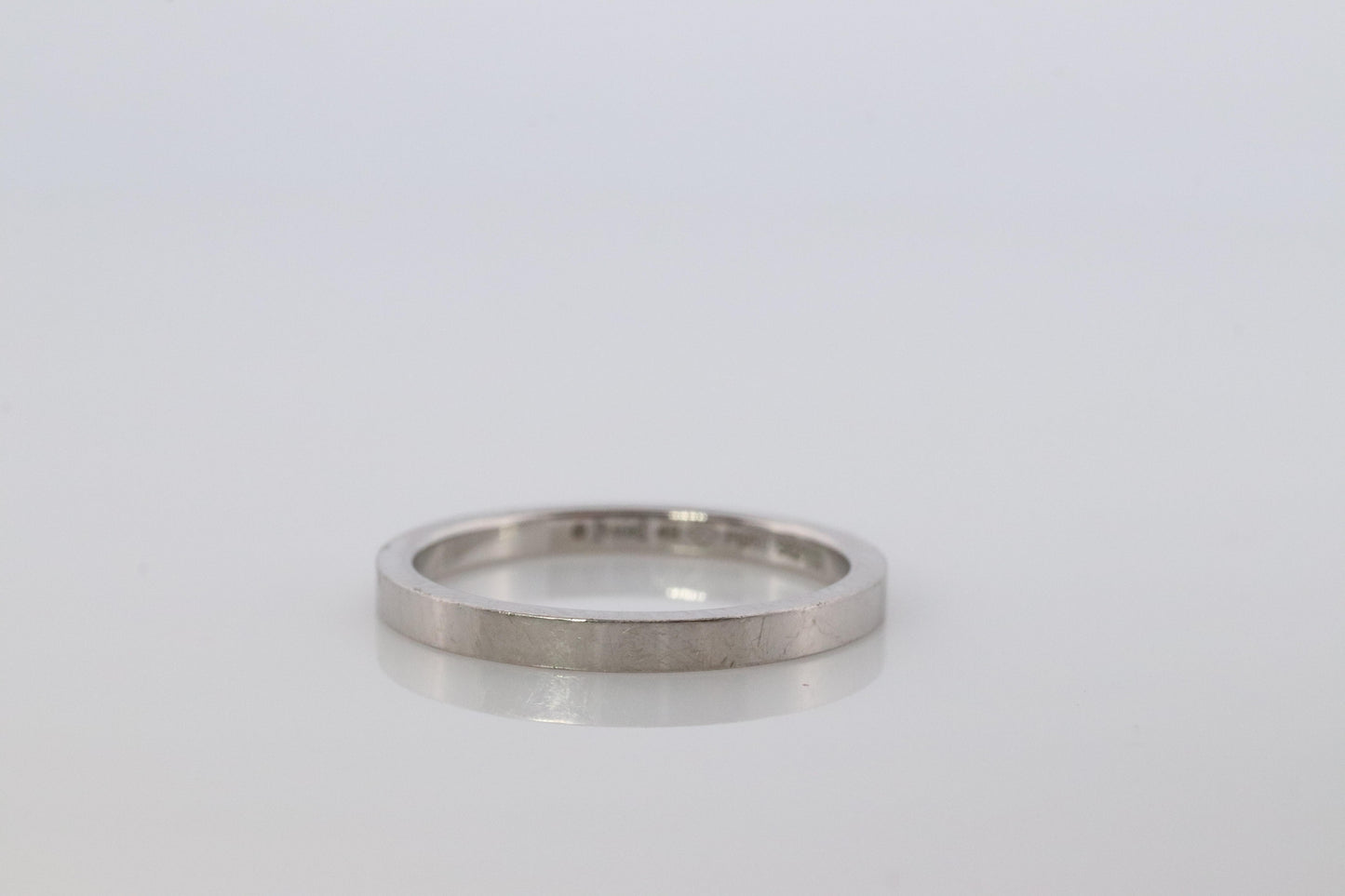 Piaget Ring. Genuine PIAGET PT950 Platinum Square Wedding Band.