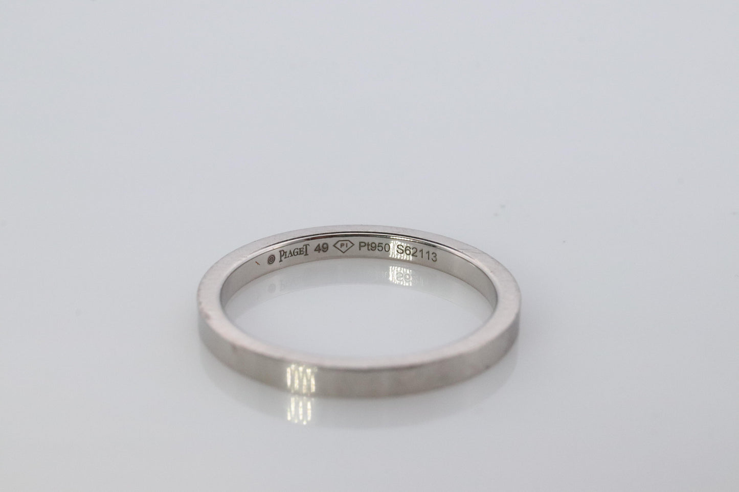 Piaget Ring. Genuine PIAGET PT950 Platinum Square Wedding Band.