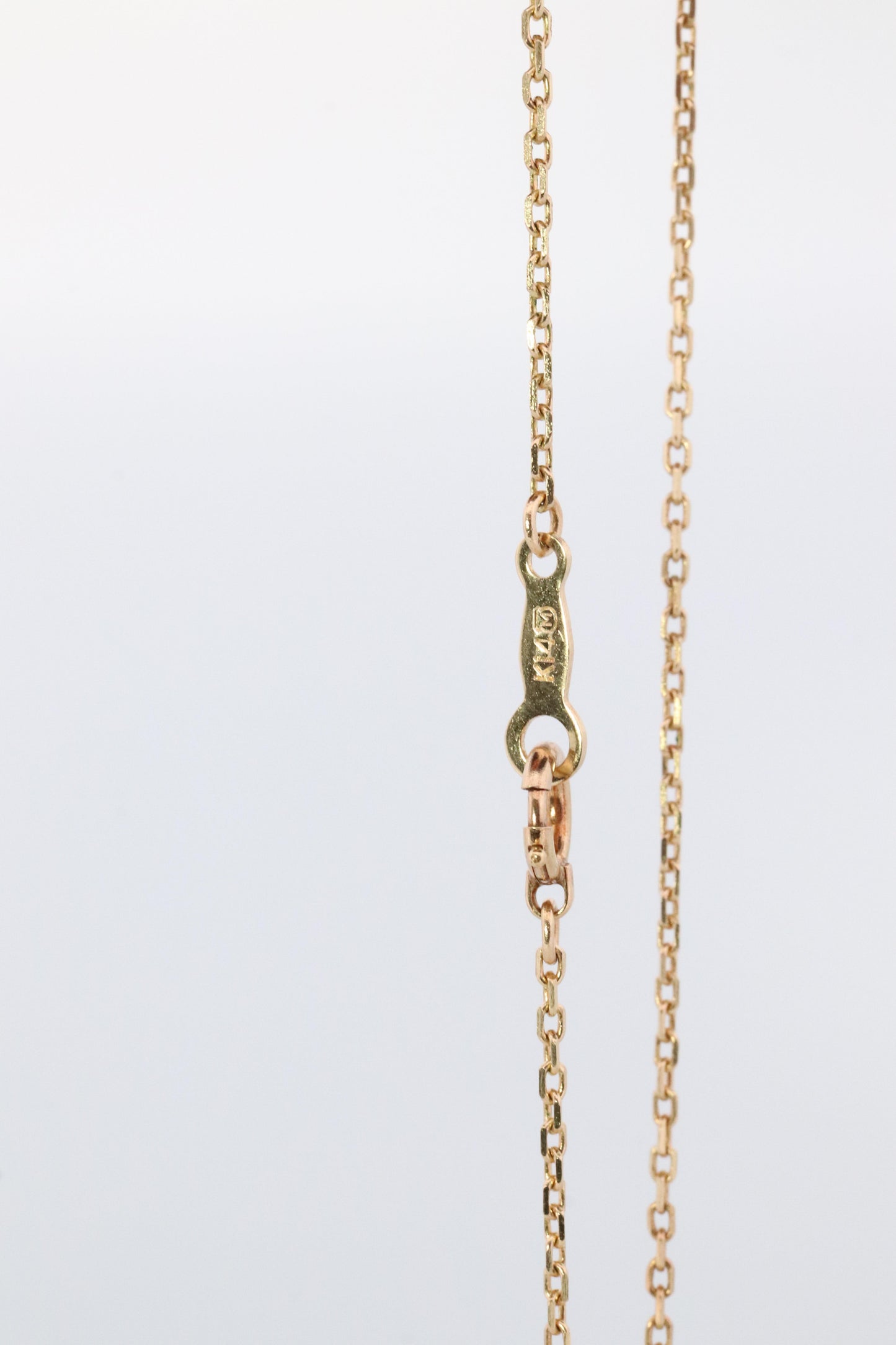 Mikimoto Pendant. 18k Gold Mikimoto Triangle Pyramid graduated Pearl Necklace.