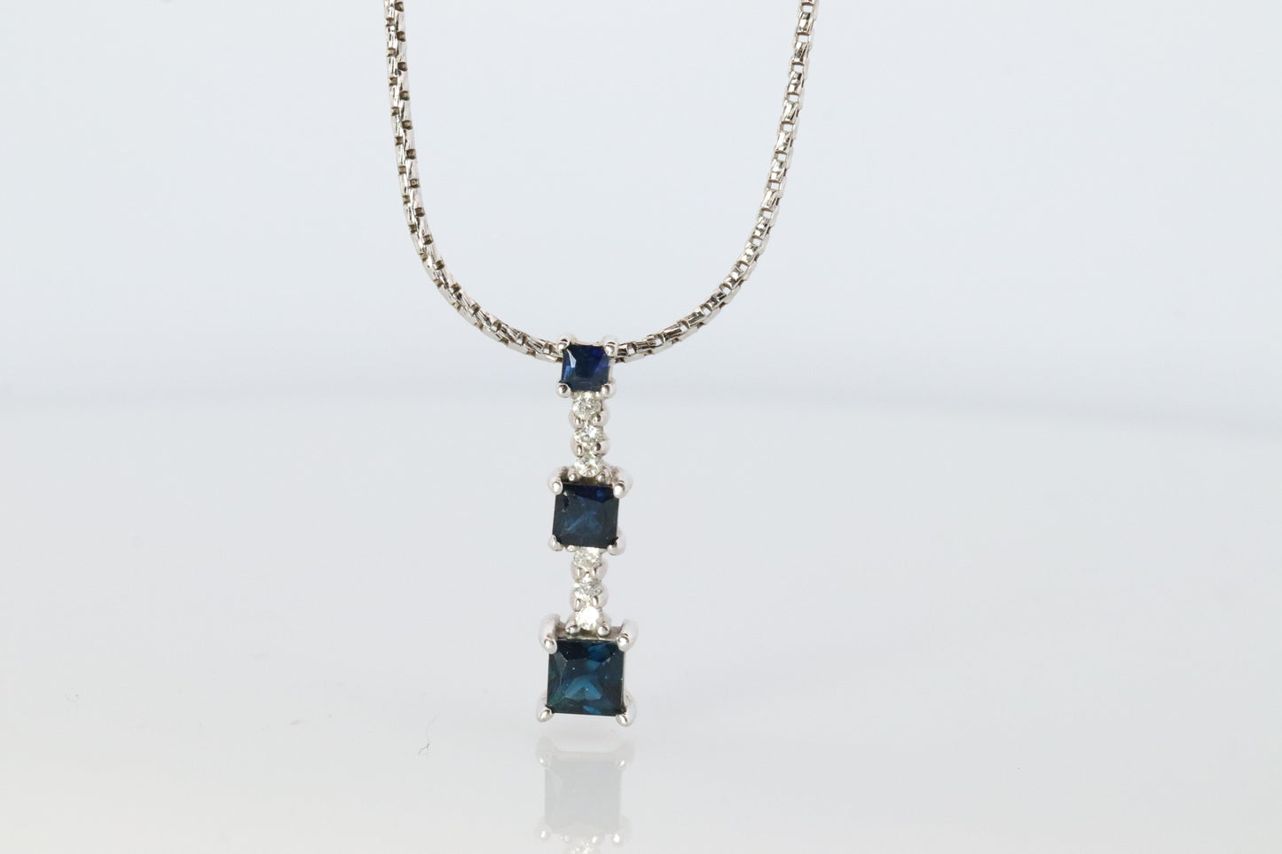 Blue Sapphire diamond Journey pendant. 14k Gold Princess Sapphires Necklace