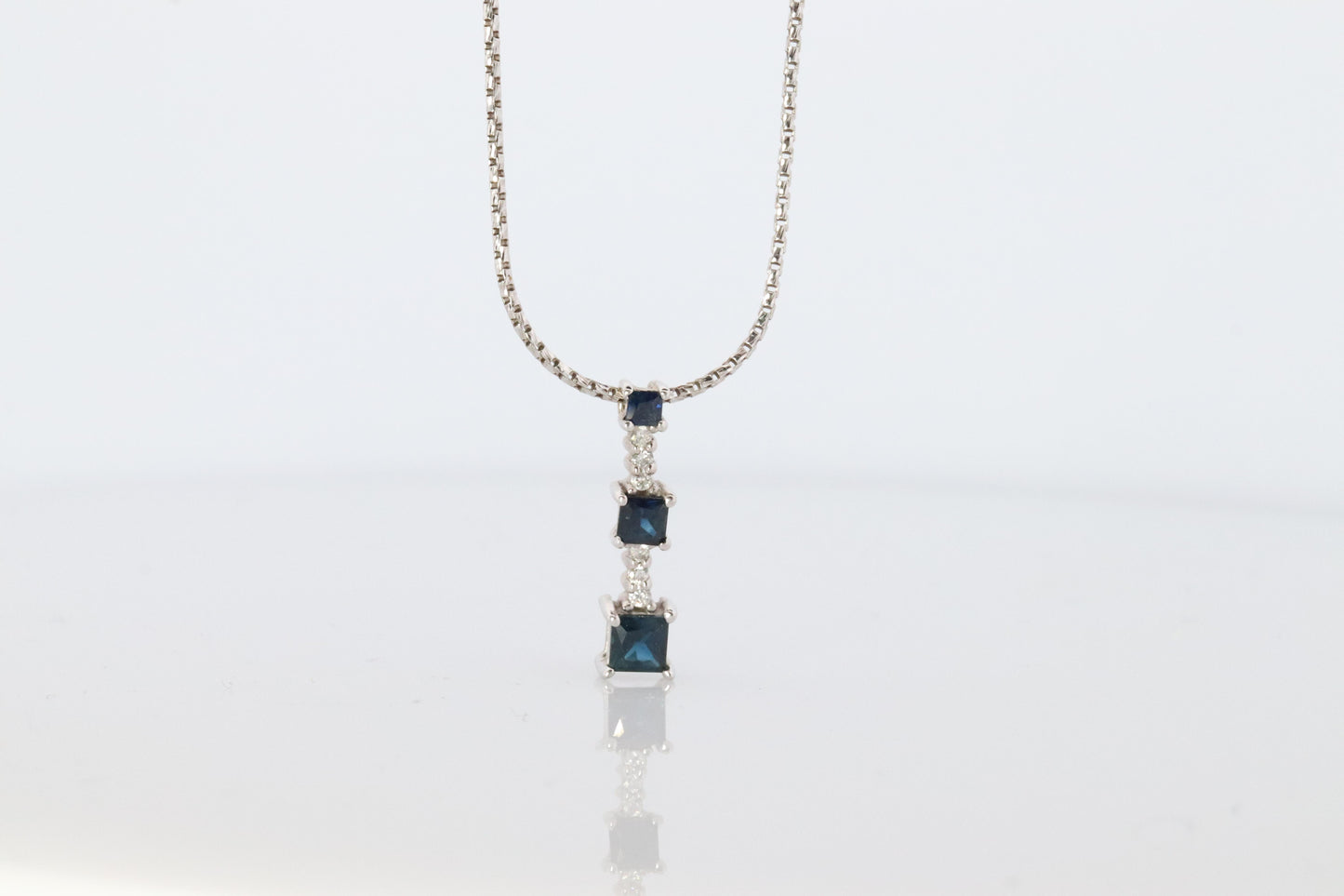 Blue Sapphire diamond Journey pendant. 14k Gold Princess Sapphires Necklace