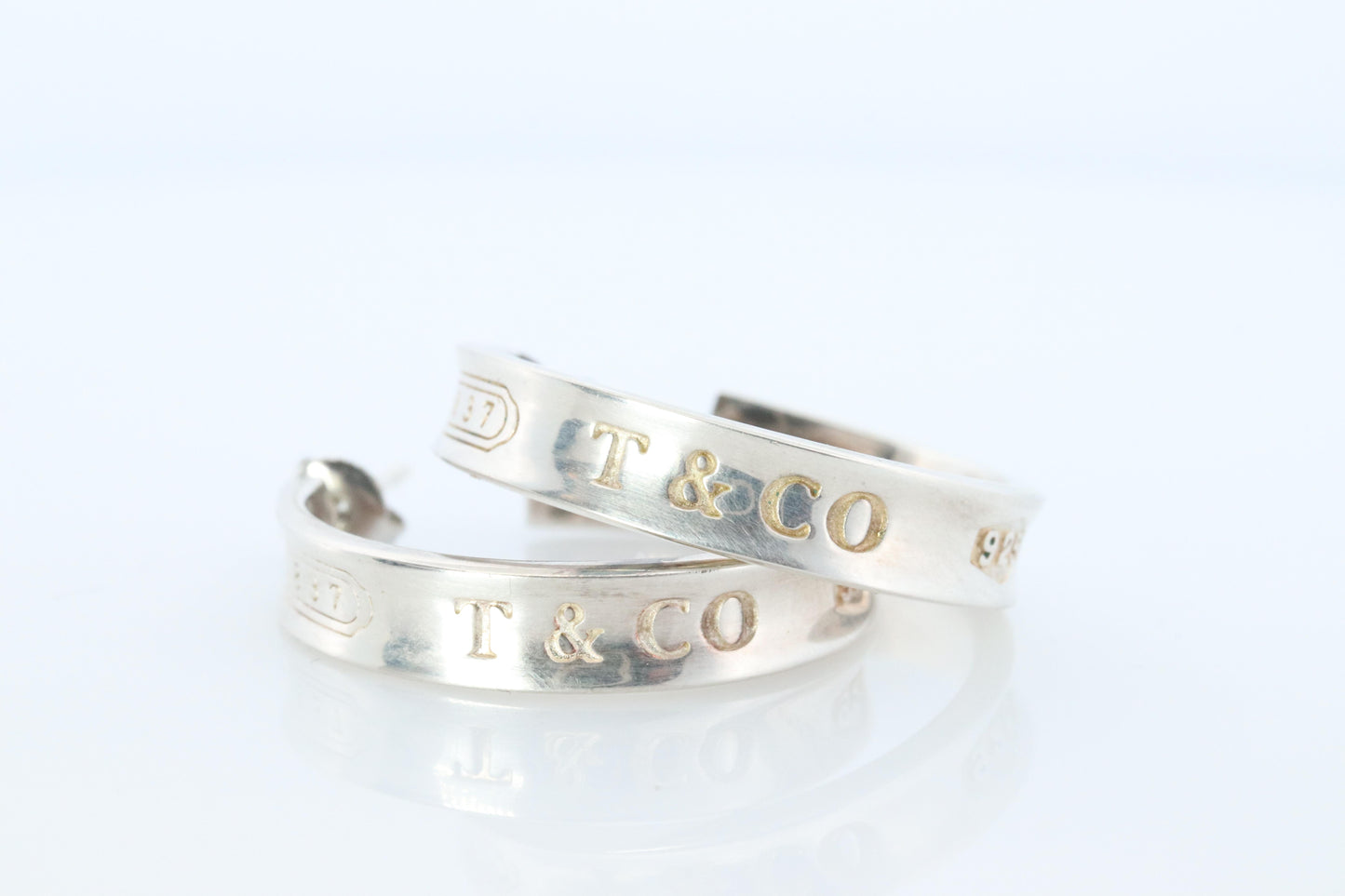 Tiffany & Co. Earrings. 1837 T and CO Hoops Sterling Silver 925 Earrings.