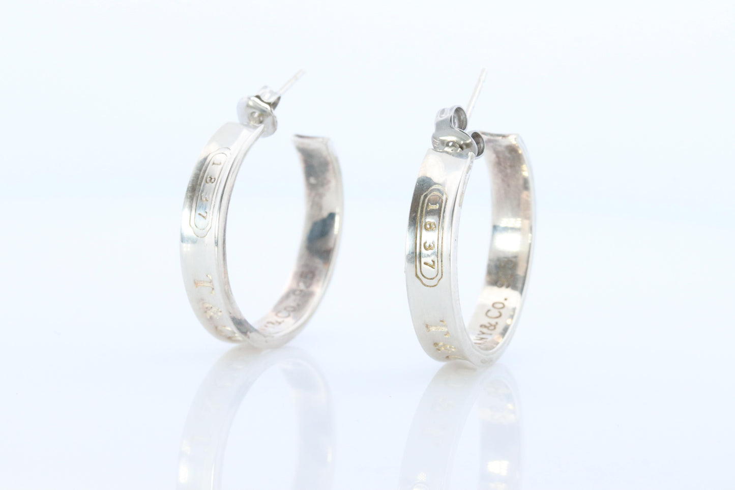 Tiffany & Co. Earrings. 1837 T and CO Hoops Sterling Silver 925 Earrings.