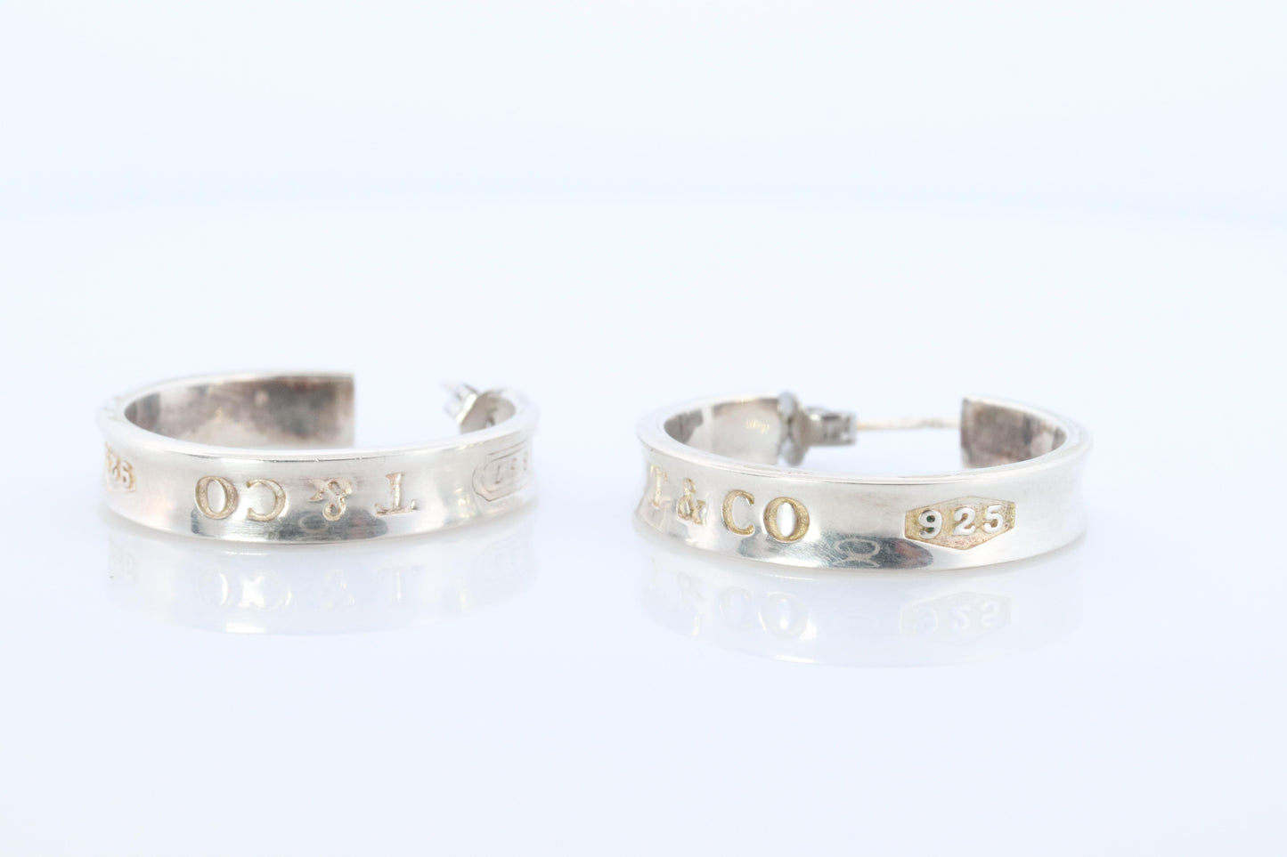 Tiffany & Co. Earrings. 1837 T and CO Hoops Sterling Silver 925 Earrings.
