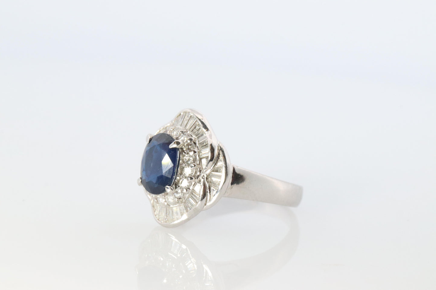 Sapphire and diamond Ballerina ring. Platinum Blue natural sapphire HALO ring