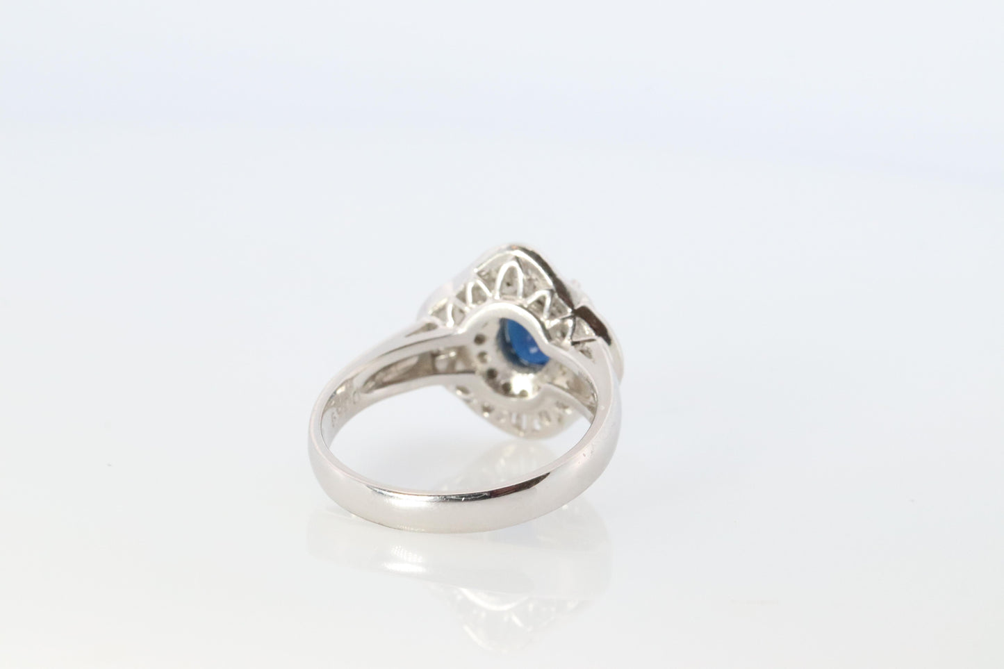 Sapphire and diamond Ballerina ring. Platinum Blue natural sapphire HALO ring