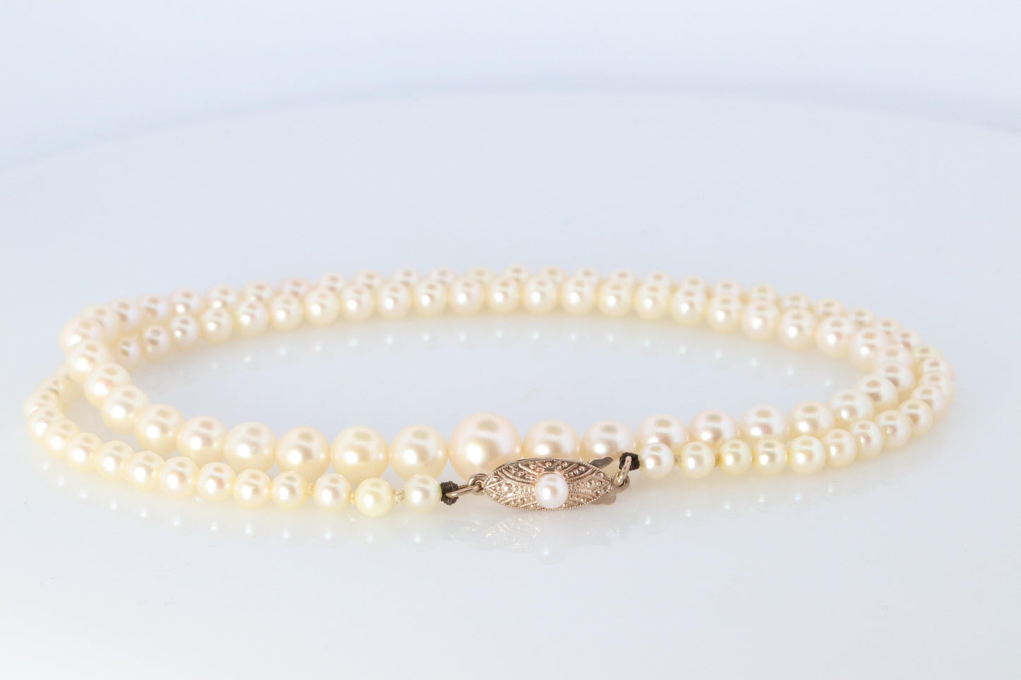 MIKIMOTO 10k Gold Pearl Necklace. Graduated Pearl Strand 18in Necklace Mikimoto