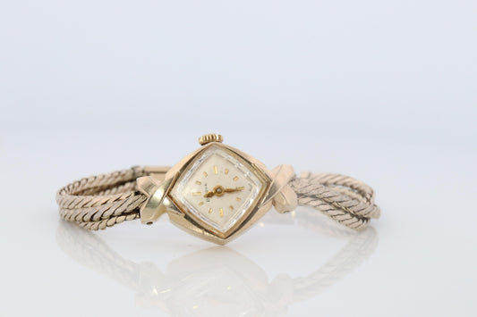 Vintage Swiss Bulova M3 1960s Women's 10k yellow gold watch with a Admiral band