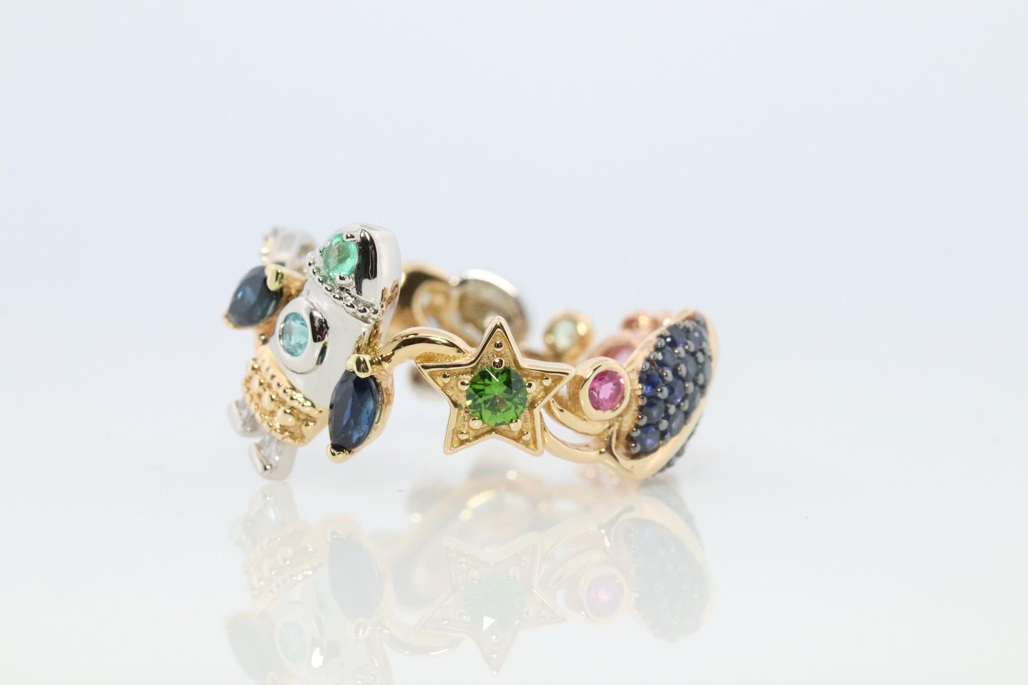 Cosmic ring. 18k and Platinum Rocket Space Planetary theme band.