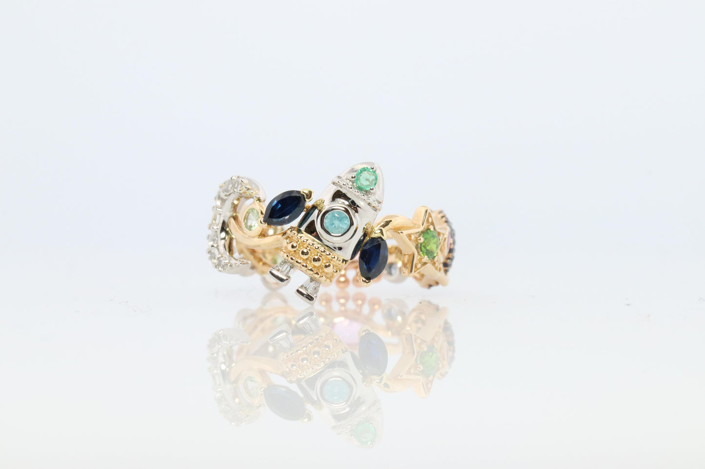 Cosmic ring. 18k and Platinum Rocket Space Planetary theme band.