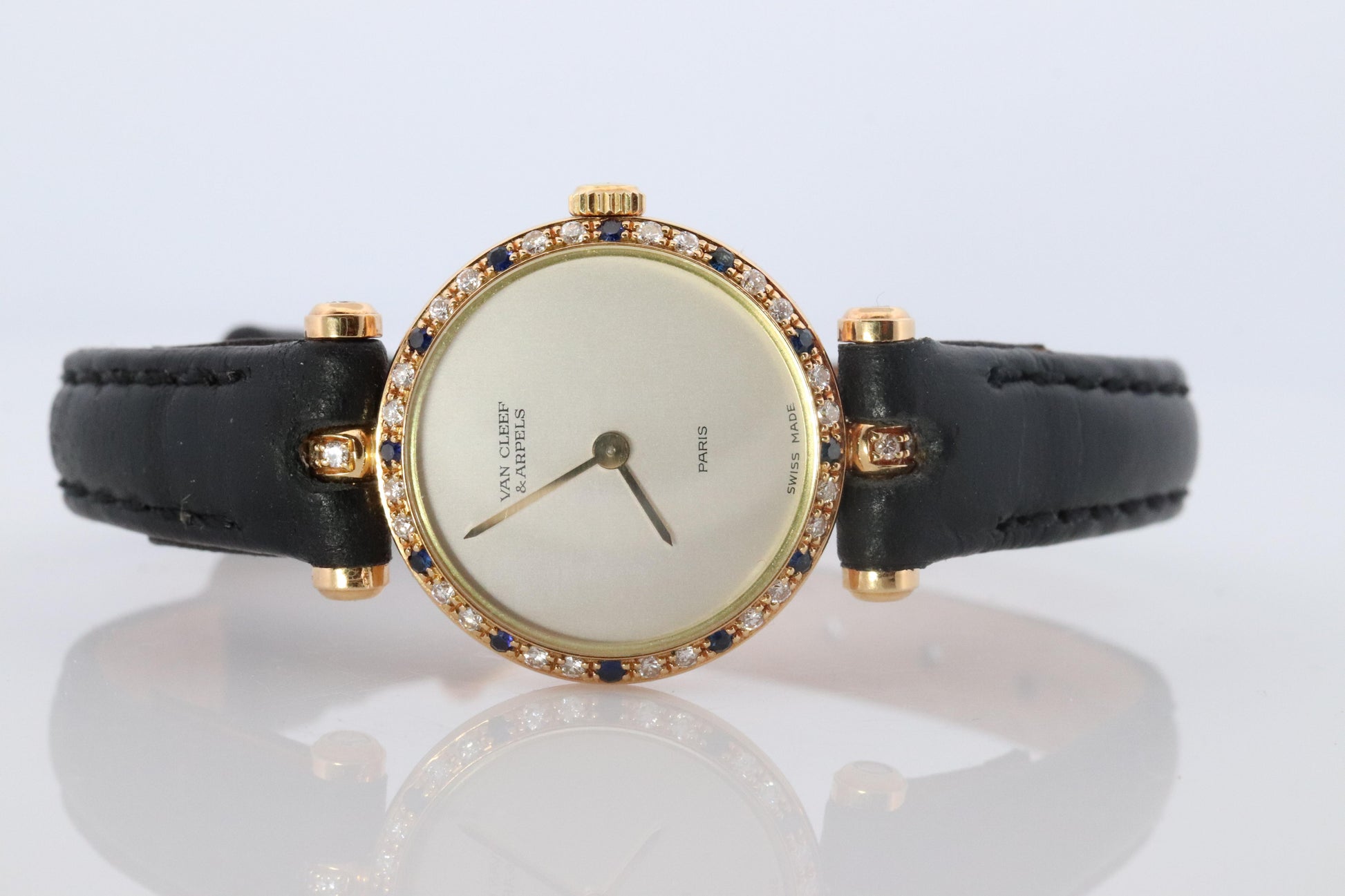 Van Cleef and Arpels 18901 watch. 18k Gold VCA Classique Diamond Sapphire Bezel.