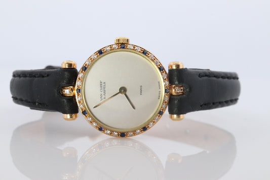 Van Cleef and Arpels 18901 watch. 18k Gold VCA Classique Diamond Sapphire Bezel.