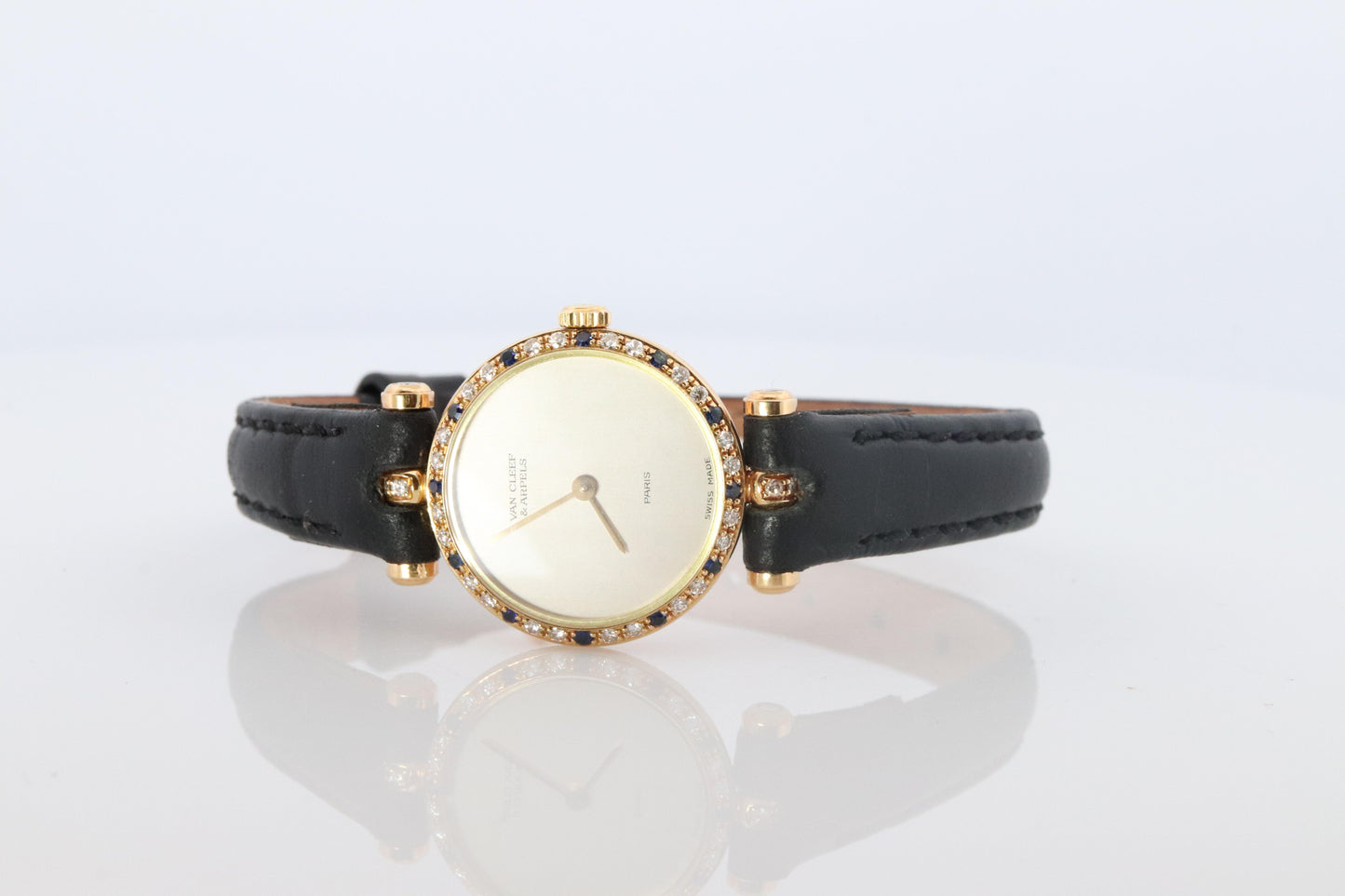 Van Cleef and Arpels 18901 watch. 18k Gold VCA Classique Diamond Sapphire Bezel.