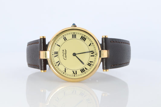 Cartier Watch. Must de Cartier Champagne Dial Vendome Round Argent Vermeil 30mm.