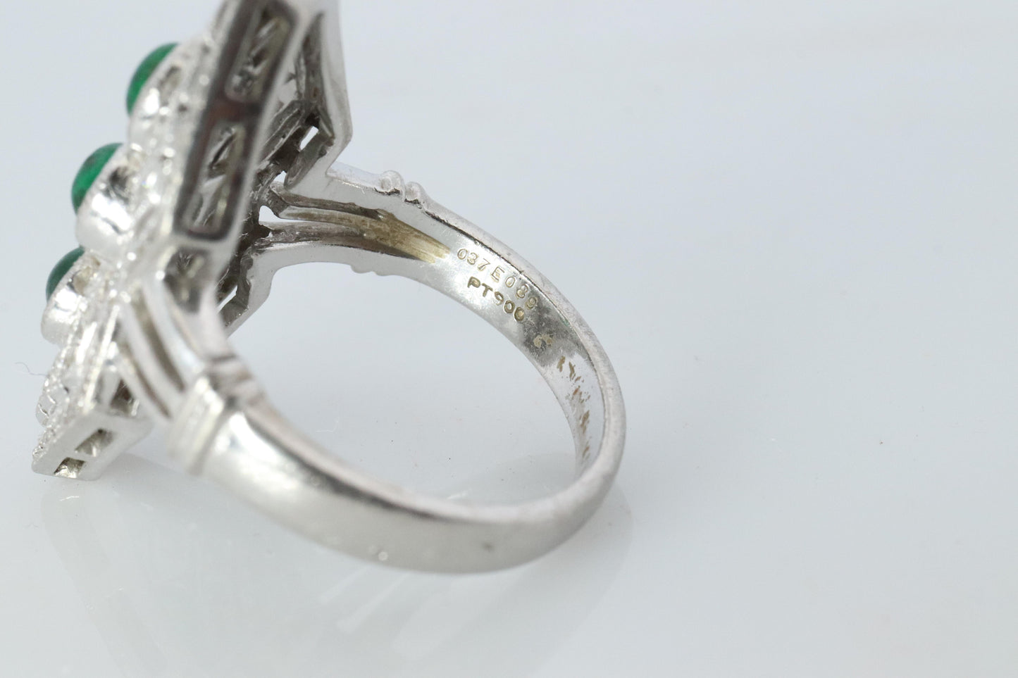 Emerald shield ring. Platinum Shield Ring Emerald Cabochon and Diamond wide band