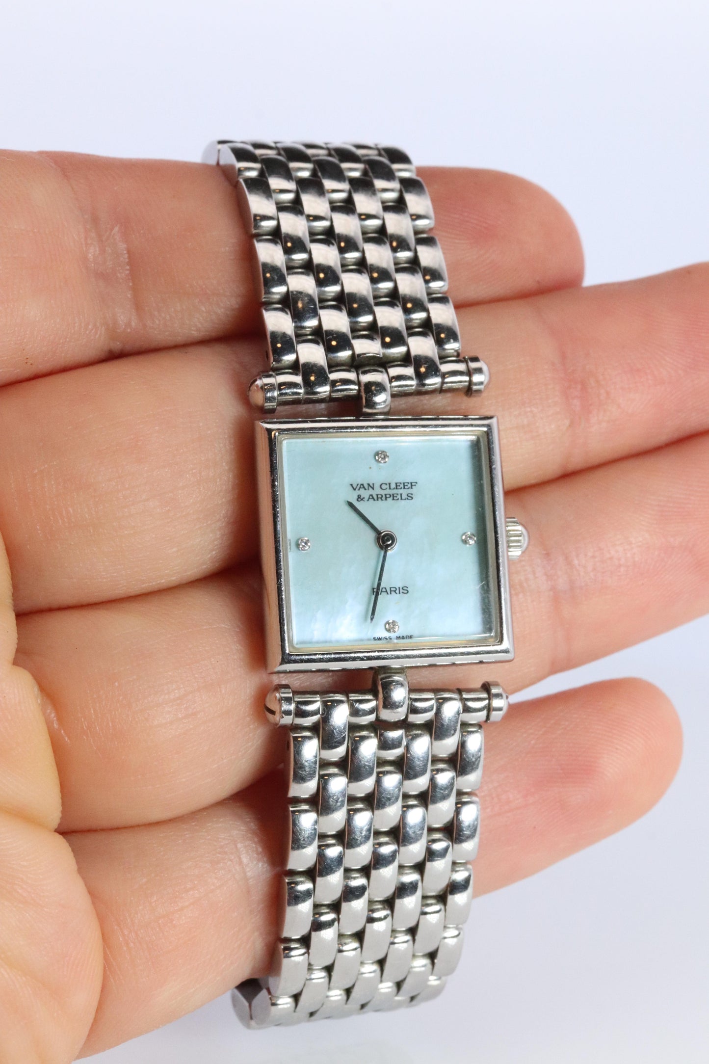 Van Cleef and Arpels 522642 watch. Classique Square Blue Shell Dial