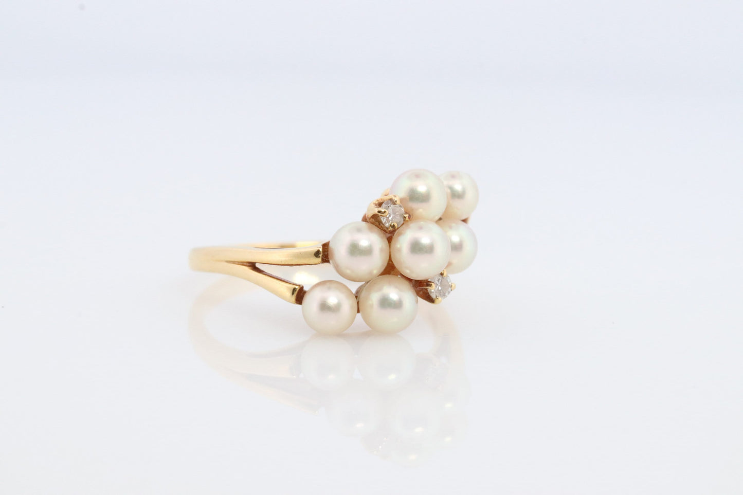 18k MIKIMOTO Cluster pearl ring. Mikimoto 750 saltwater pearl and diamond cluster bypass ring. Grape vine pearls.