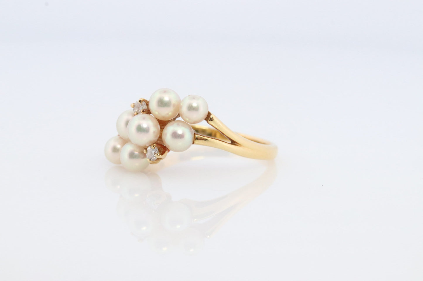 18k MIKIMOTO Cluster pearl ring. Mikimoto 750 saltwater pearl and diamond cluster bypass ring. Grape vine pearls.