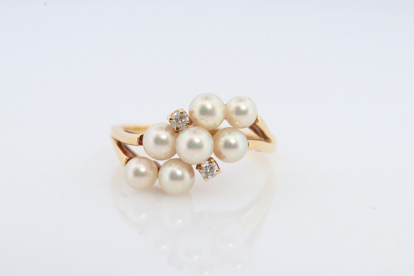18k MIKIMOTO Cluster pearl ring. Mikimoto 750 saltwater pearl and diamond cluster bypass ring. Grape vine pearls.