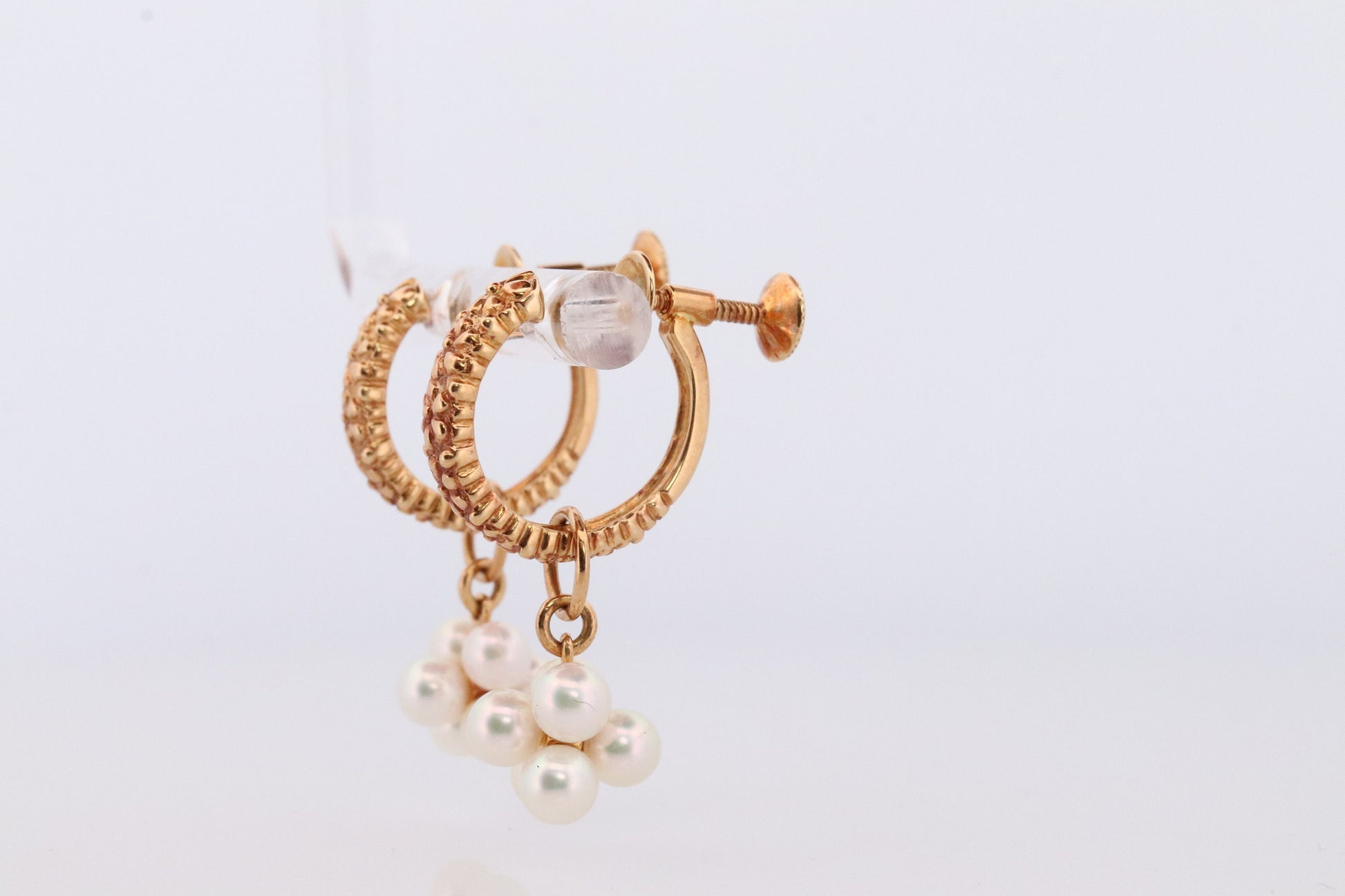 18k MIKIMOTO earrings. Vintage Mikimoto Akoya pearl screw back earrings. Hoop bunch leaf unpierced screw back earrings.
