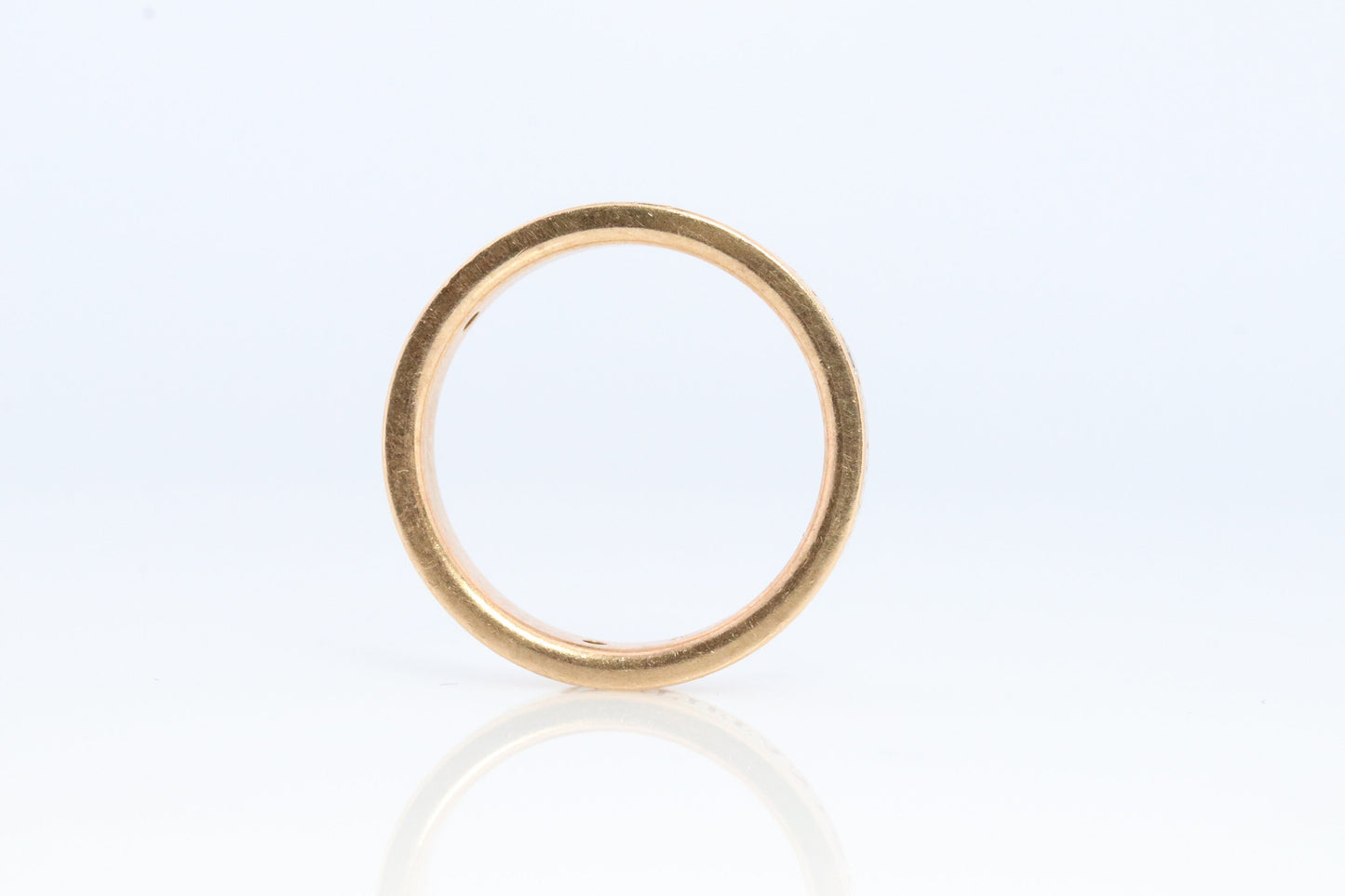 18k Tiffany and Co. band. 18k Tiffany Company Diamond wedding band. 18k Rose Gold Three diamond Bezel Vintage Tiffany & Co band.