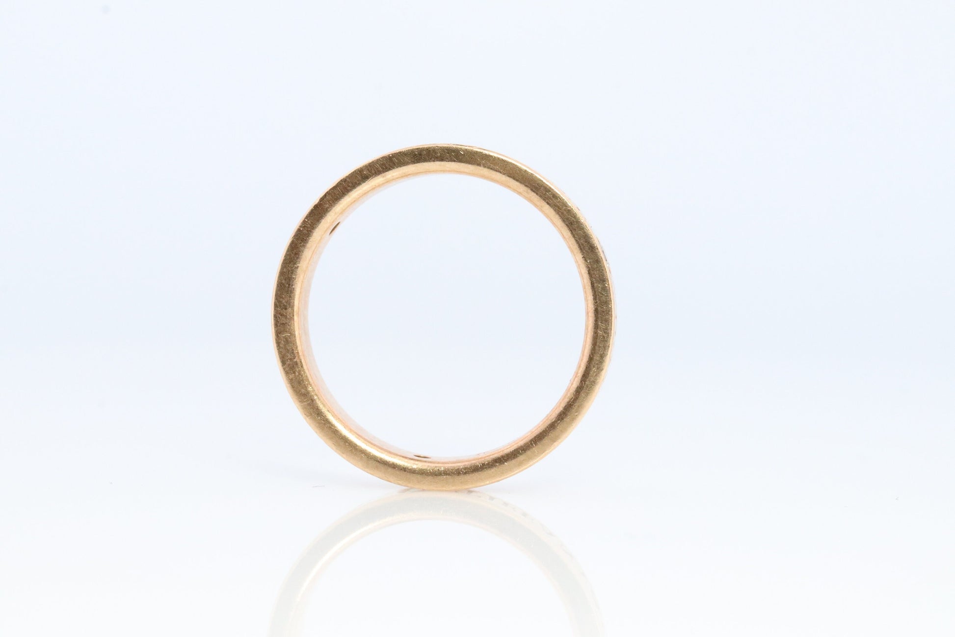 18k Tiffany and Co. band. 18k Tiffany Company Diamond wedding band. 18k Rose Gold Three diamond Bezel Vintage Tiffany & Co band.