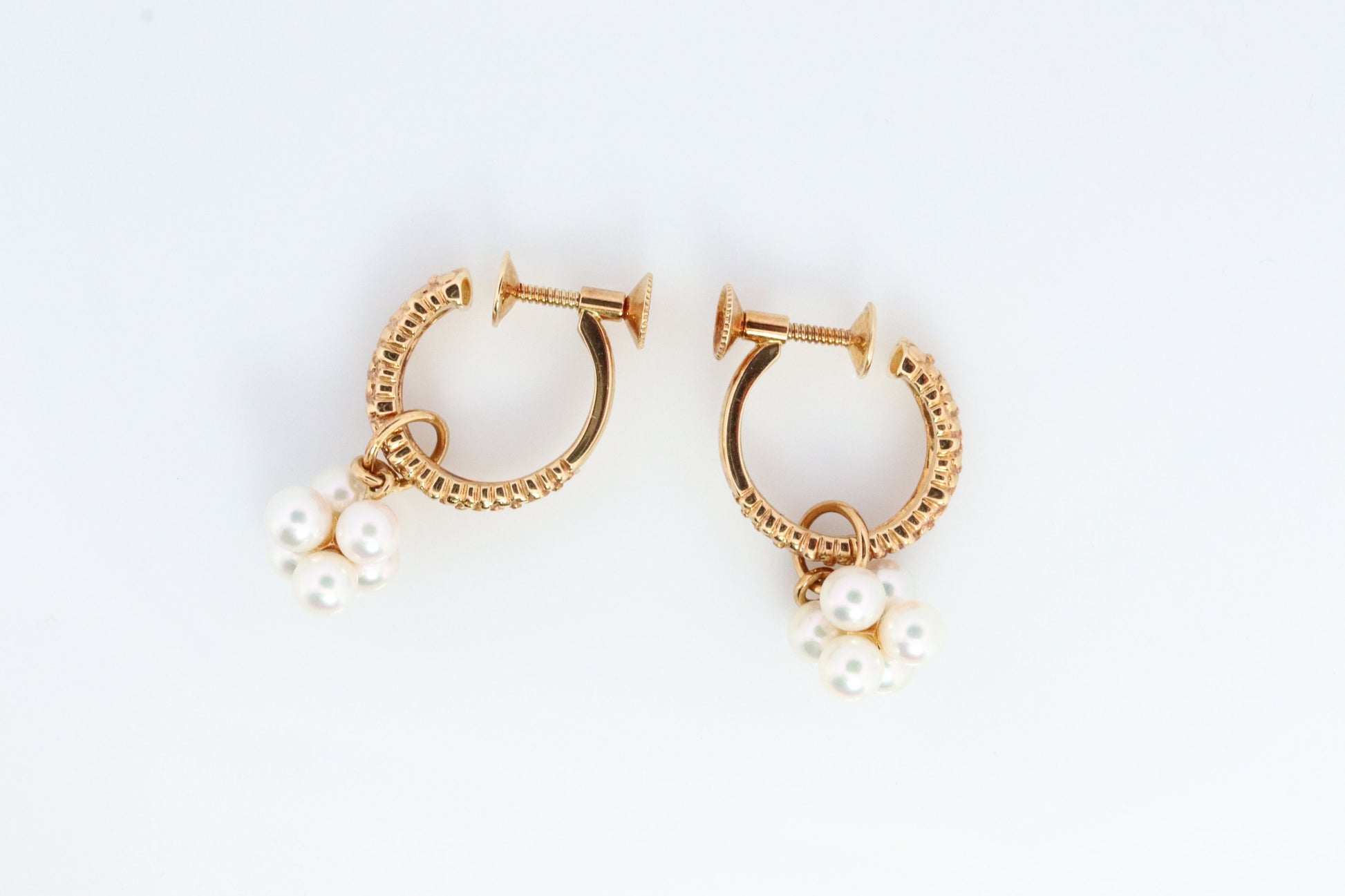 18k MIKIMOTO earrings. Vintage Mikimoto Akoya pearl screw back earrings. Hoop bunch leaf unpierced screw back earrings.