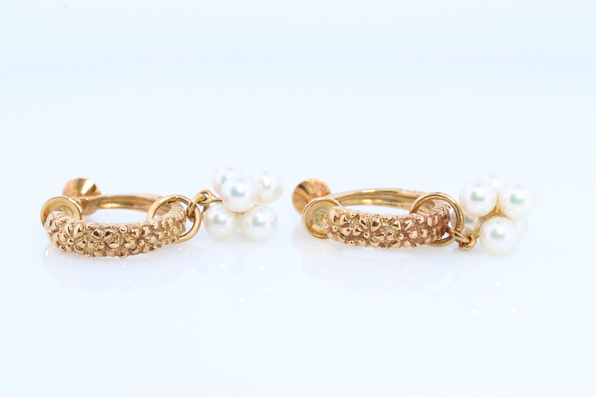 18k MIKIMOTO earrings. Vintage Mikimoto Akoya pearl screw back earrings. Hoop bunch leaf unpierced screw back earrings.