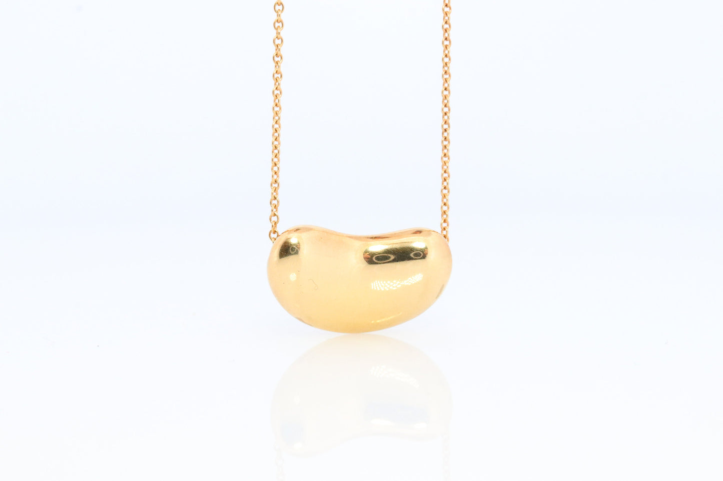 Tiffany & Co. 18k Gold Chain and Bean Pendant Necklace. 750 Yellow Gold Tiffany Company Necklace. Elsa Peretti Bean.