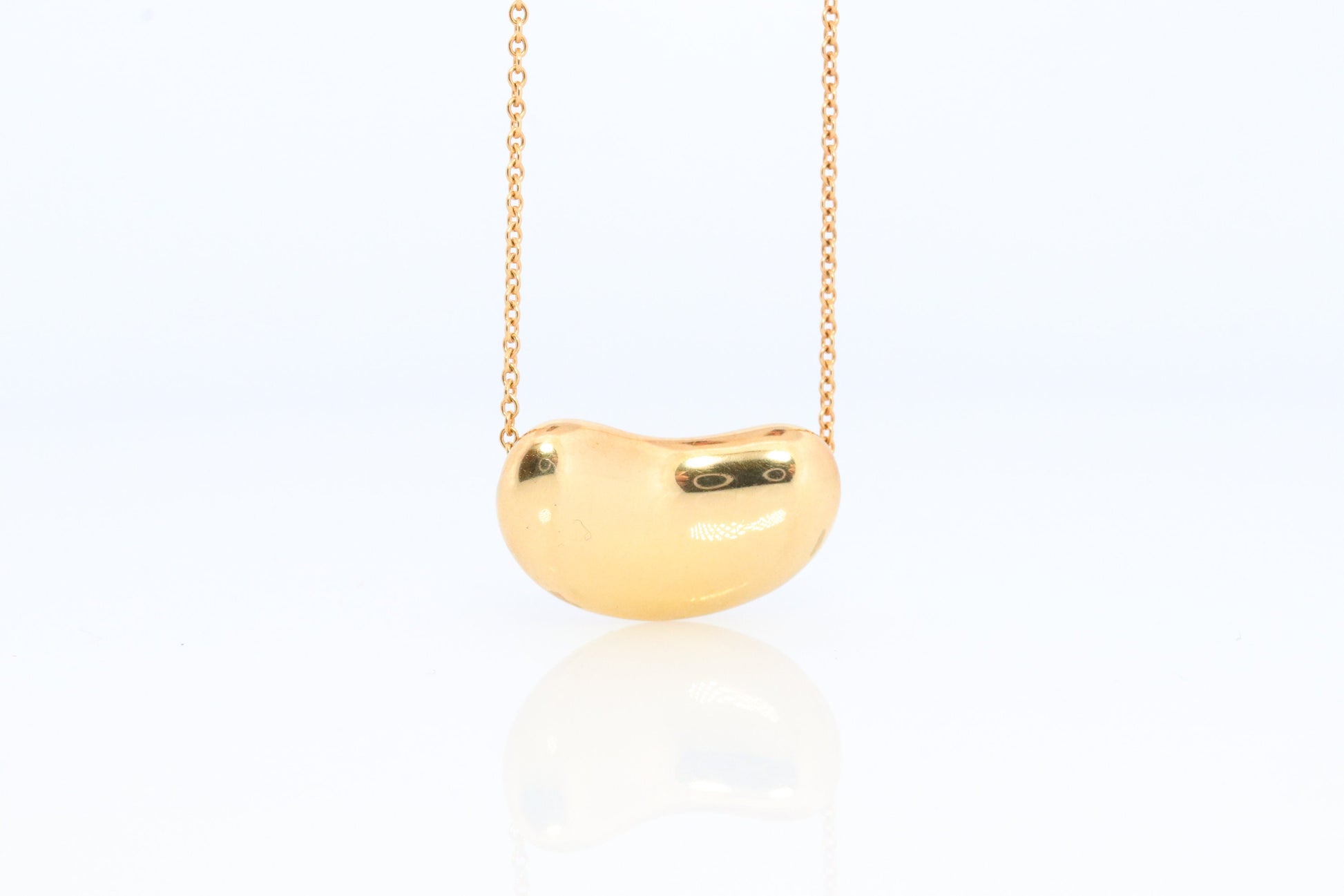 Tiffany & Co. 18k Gold Chain and Bean Pendant Necklace. 750 Yellow Gold Tiffany Company Necklace. Elsa Peretti Bean.