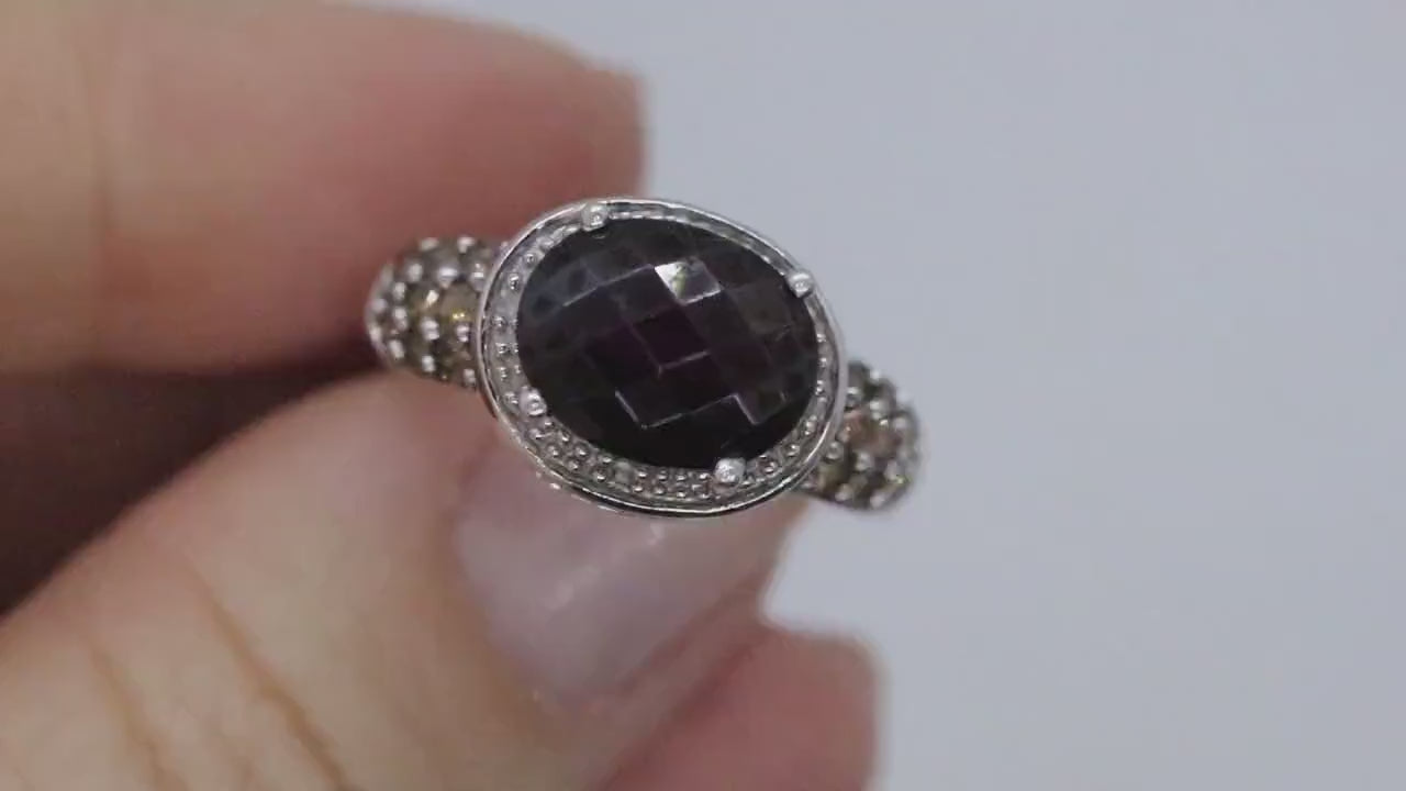 14k Large Faceted Garnet solitaire ring with champagne diamonds. (117)