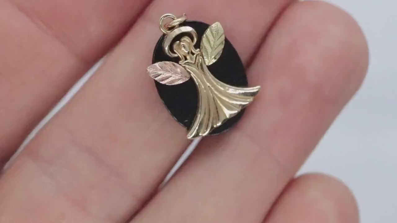 Black Hills Gold Angel Onyx Pendant. 10k multi tone Black Hills Gold Guardian Angel Pendant (58/65)