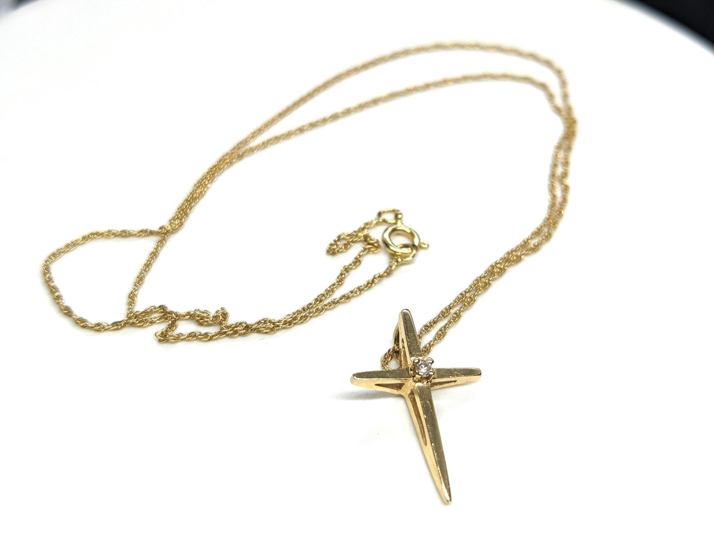 14k Diamond cross. 14k Yellow gold crucifix with twisted rope necklace chain