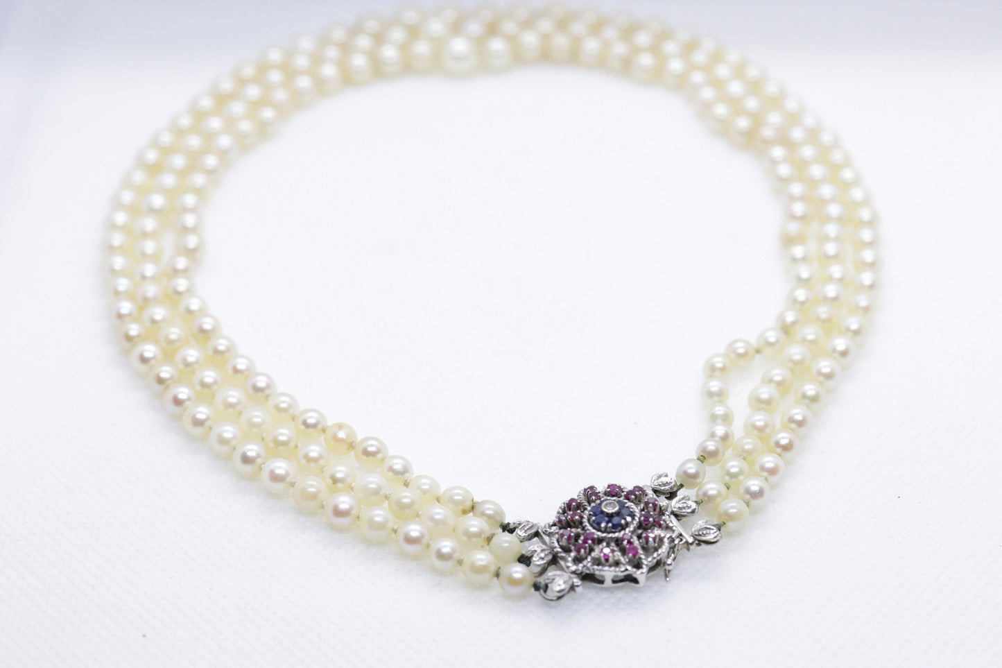 18k Sapphire Ruby Diamond Graduated Saltwater Pearl triple thread necklace.