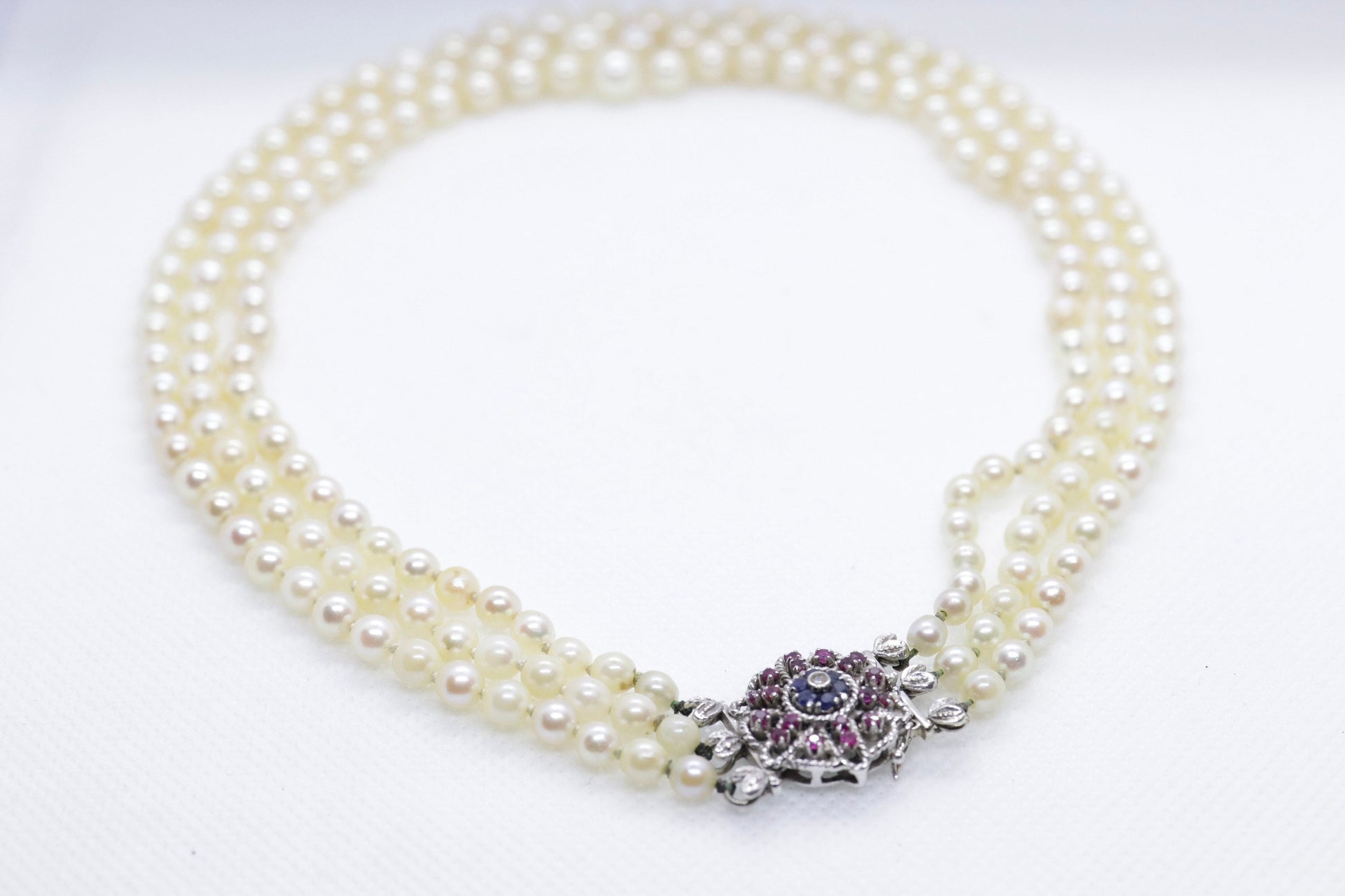 18k Sapphire Ruby Diamond Graduated Saltwater Pearl triple thread necklace.
