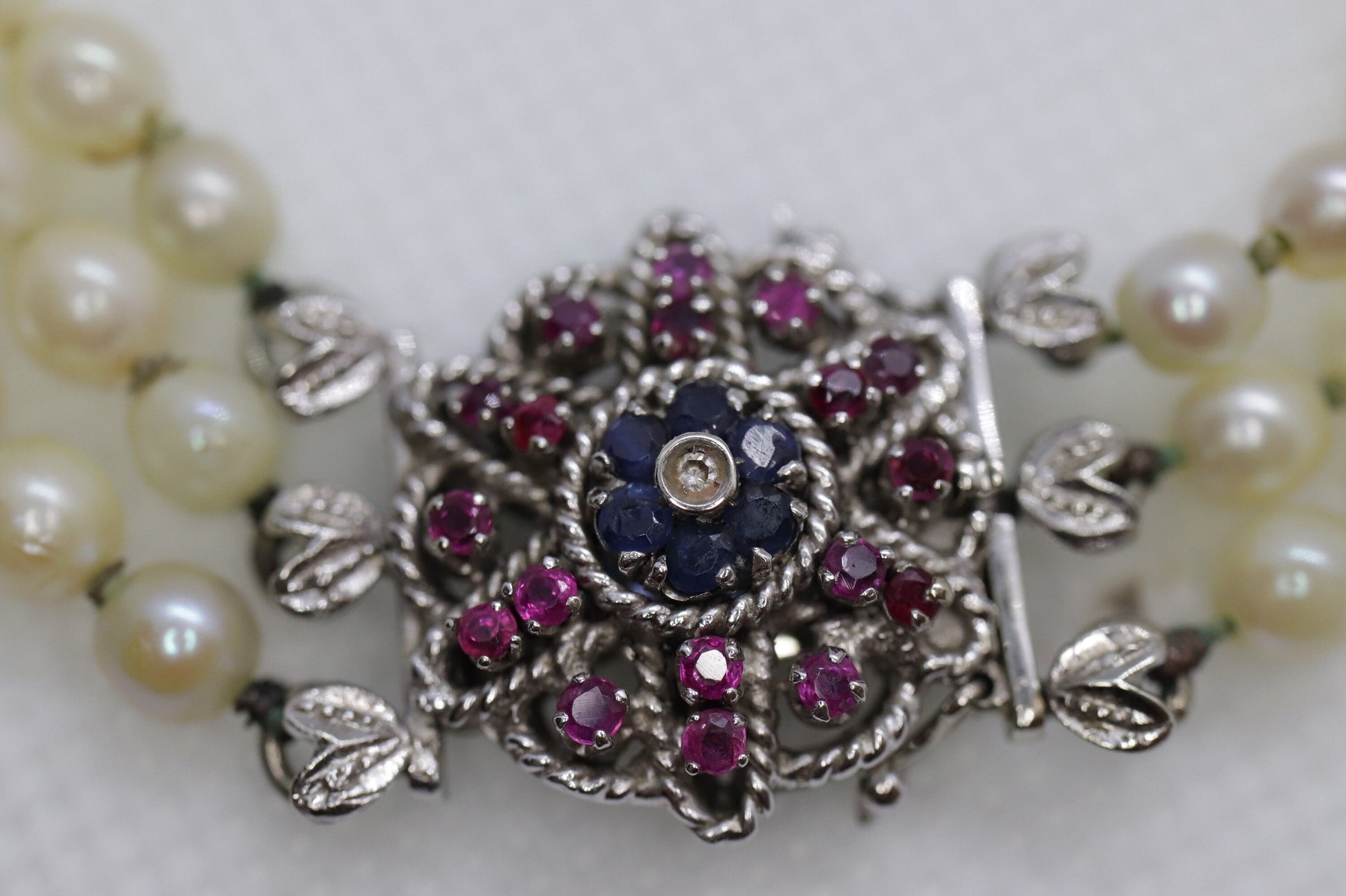18k Sapphire Ruby Diamond Graduated Saltwater Pearl triple thread necklace.