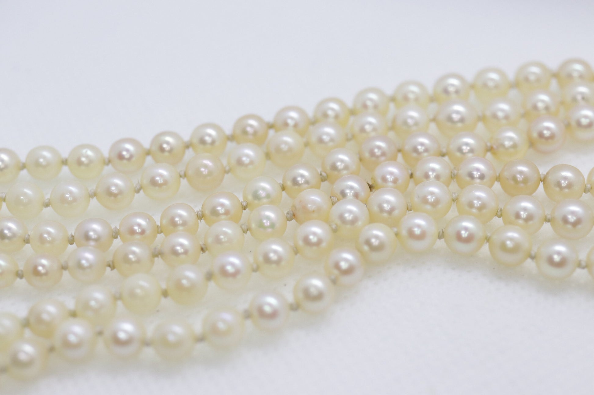 18k Sapphire Ruby Diamond Graduated Saltwater Pearl triple thread necklace.