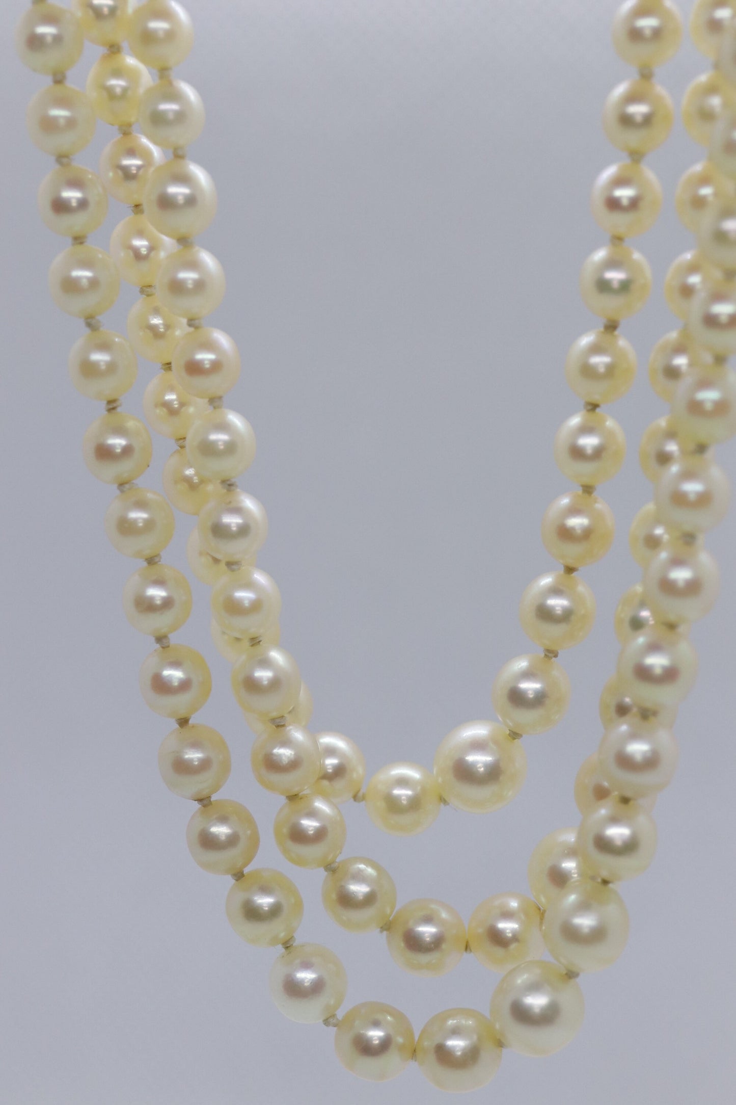 18k Sapphire Ruby Diamond Graduated Saltwater Pearl triple thread necklace.