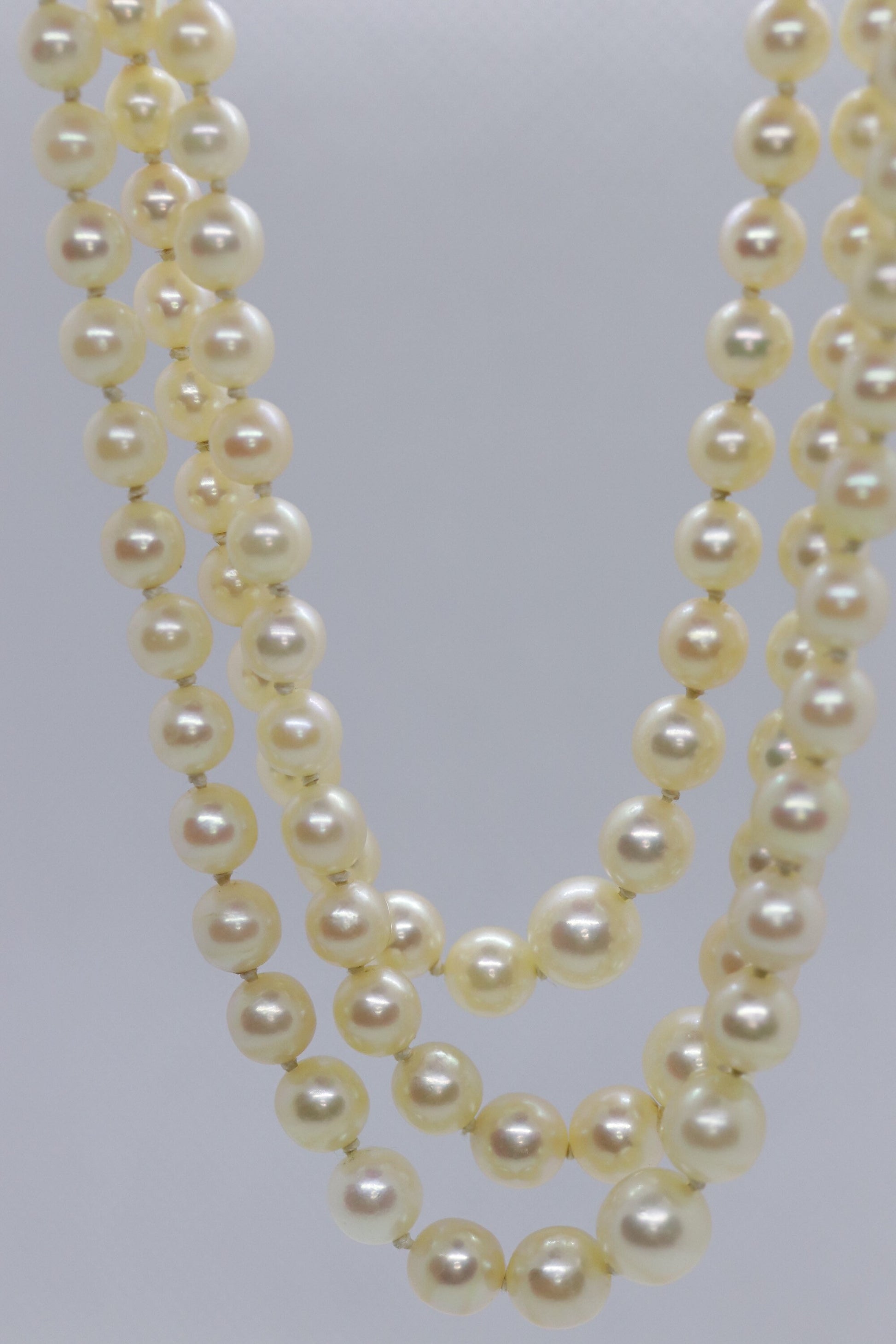 18k Sapphire Ruby Diamond Graduated Saltwater Pearl triple thread necklace.