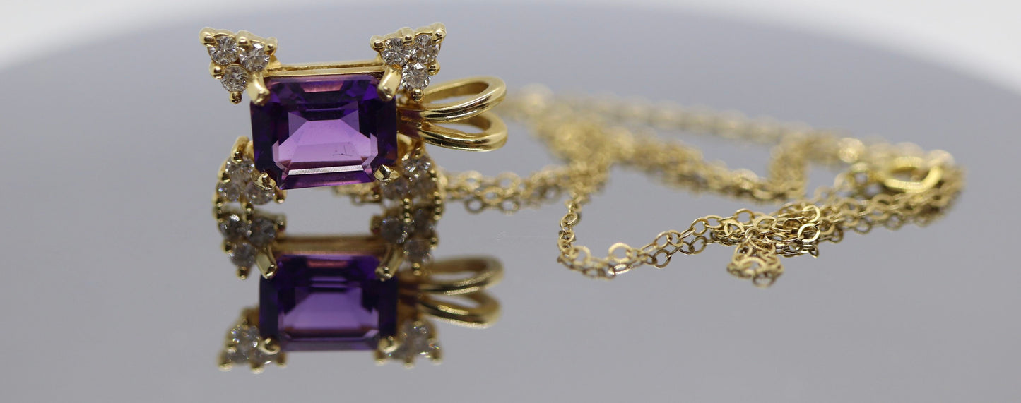 14k Amethyst emerald cut with Diamonds pendant. Diamond cluster star and 16in rolo necklace
